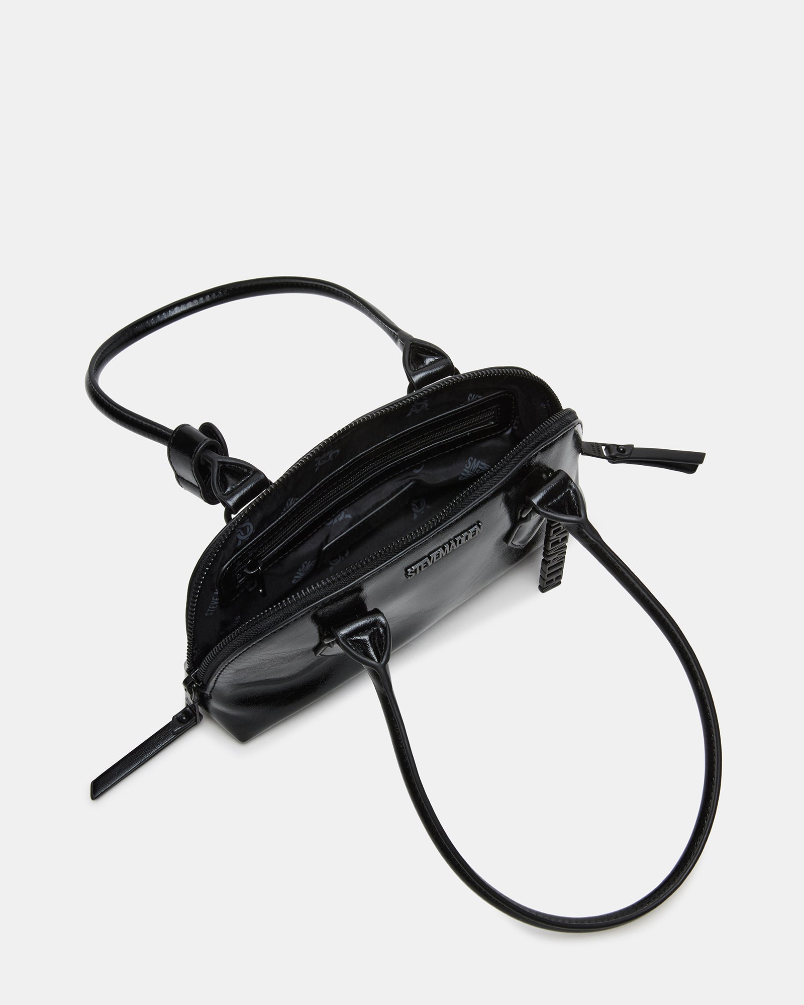 Side view showcasing the top zipper closure of the stylish shoulder bag.