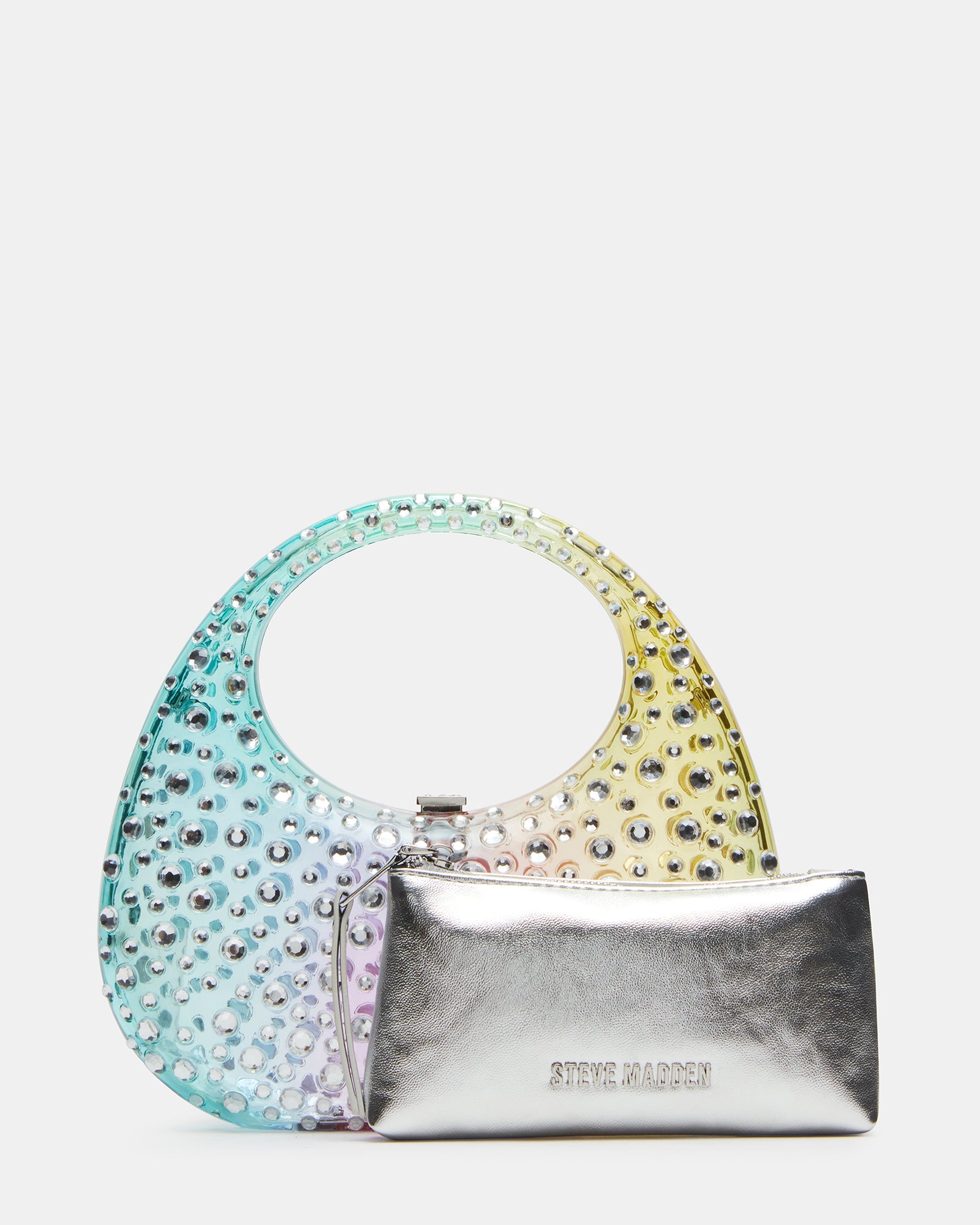 Model wearing clear shoulder bag with rhinestones crossbody in urban setting