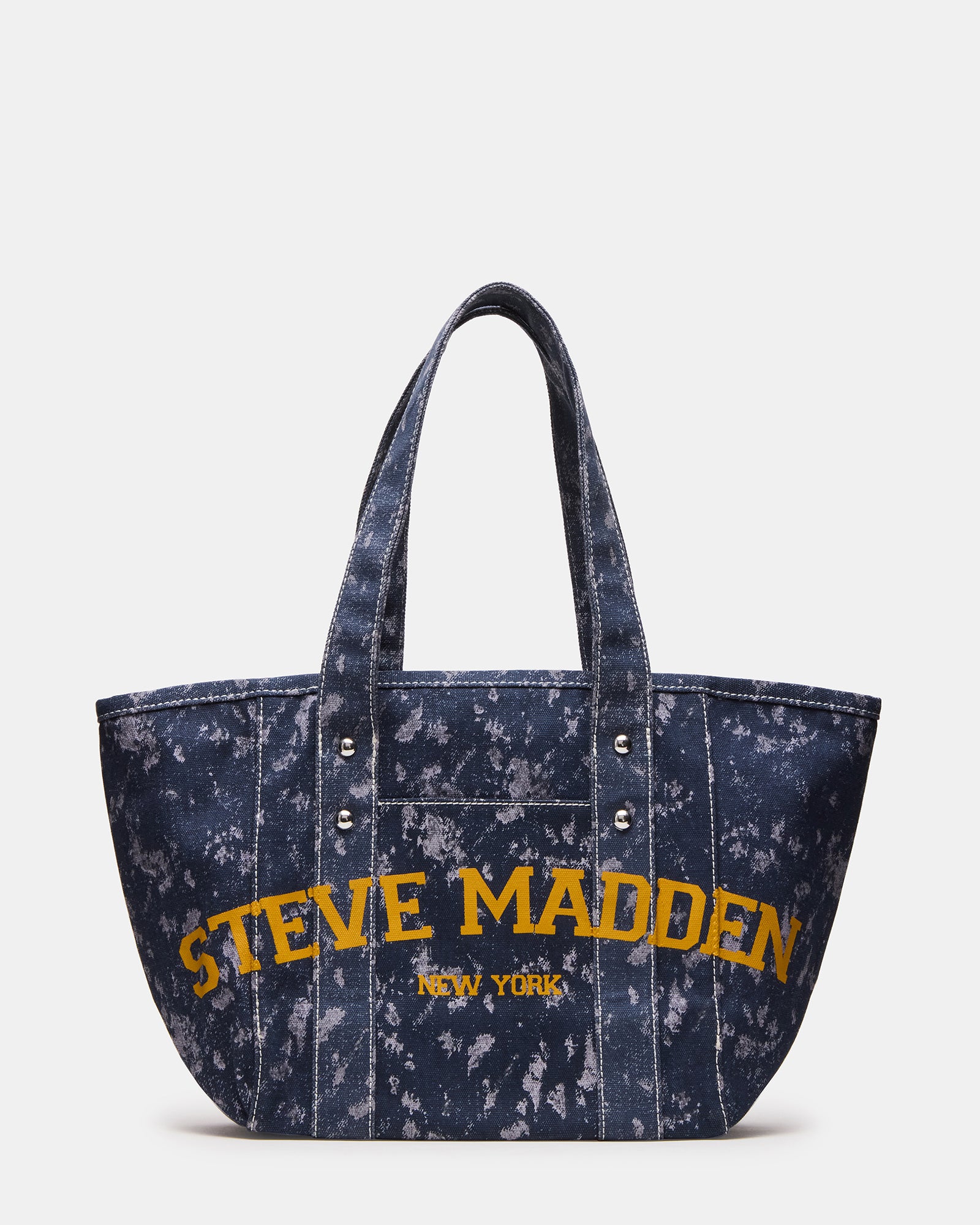 Close-up of stud rivet and stitching detail on denim tote bag