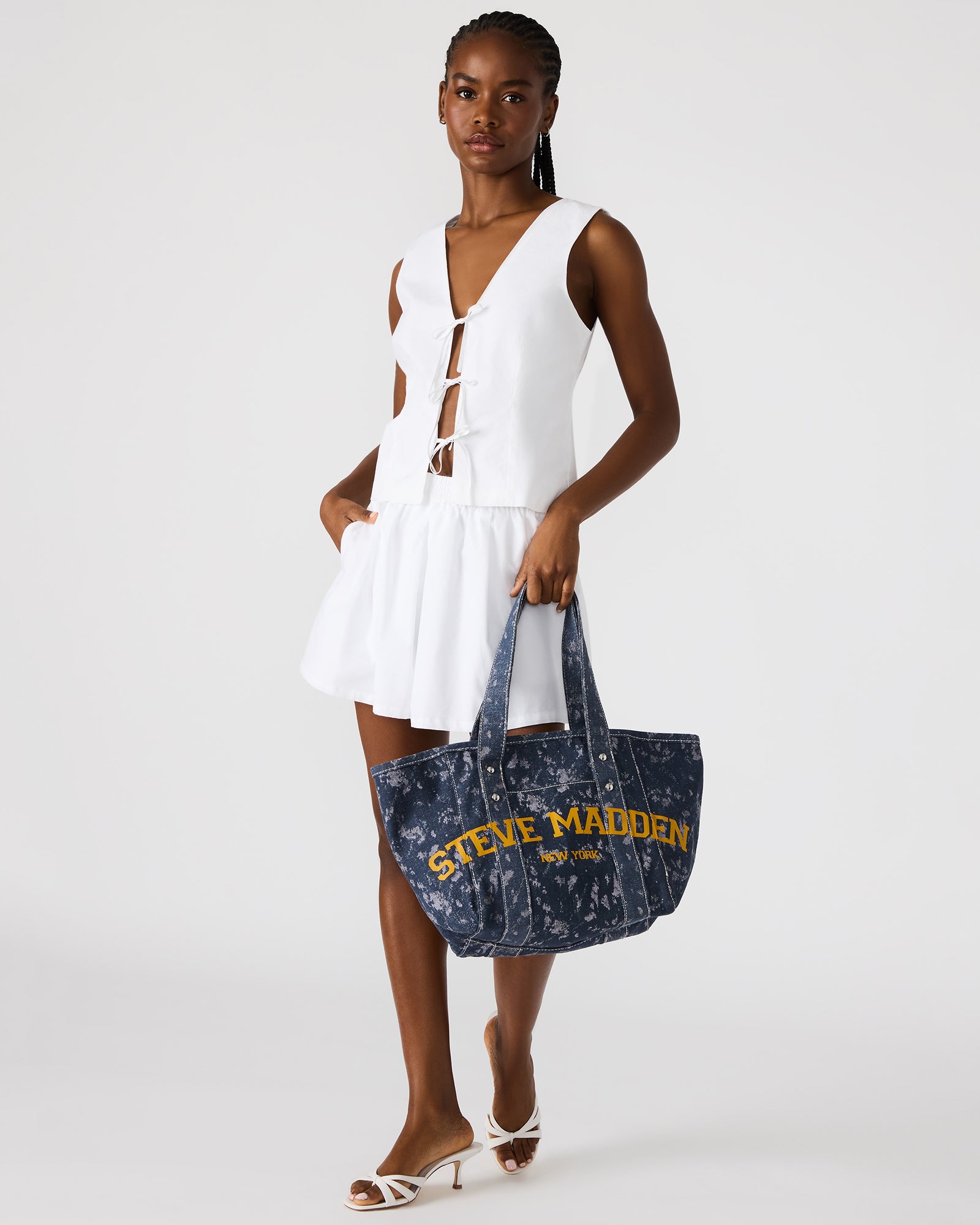 Side view of summer shoulder bag with front pocket access