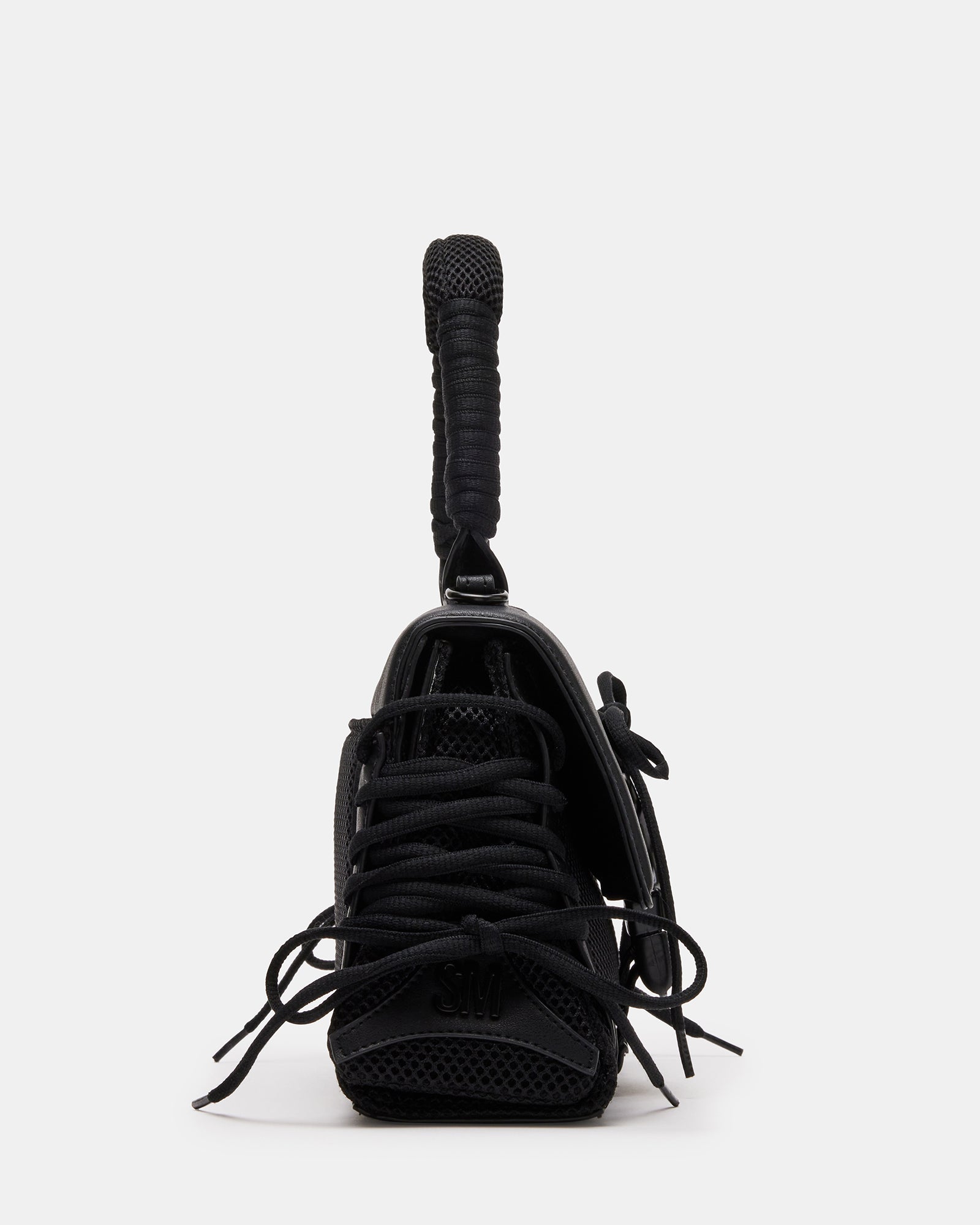 Diego bag styled with casual streetwear, showing adjustable crossbody strap