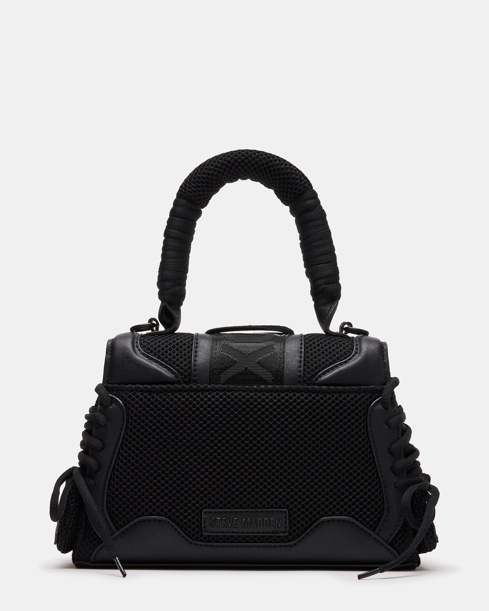 Close-up of mesh overlay and cushion handle detail of the structured handbag