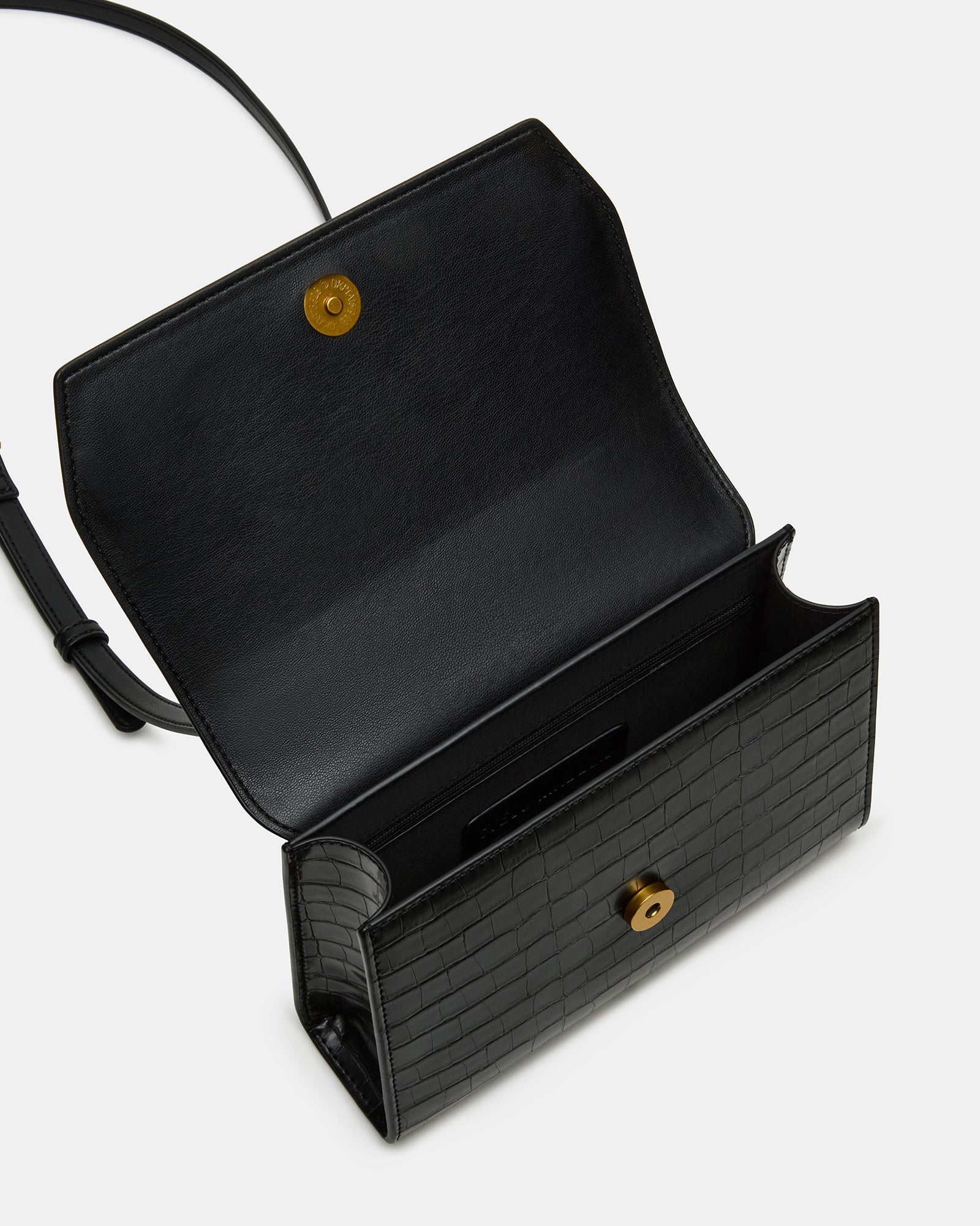 Stylish Elloise handbag displayed with adjustable strap.