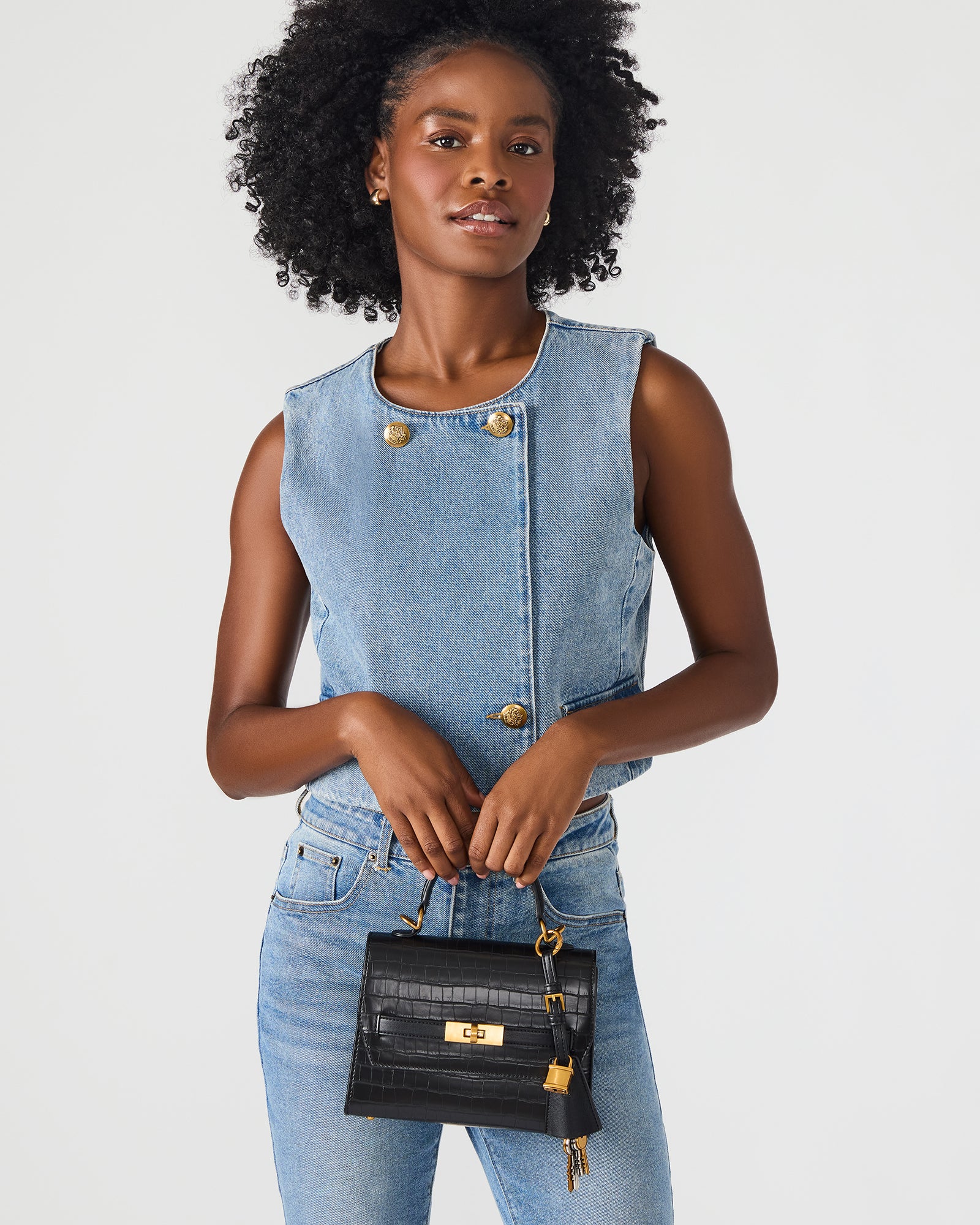 Stylish Elloise handbag displayed with adjustable strap.