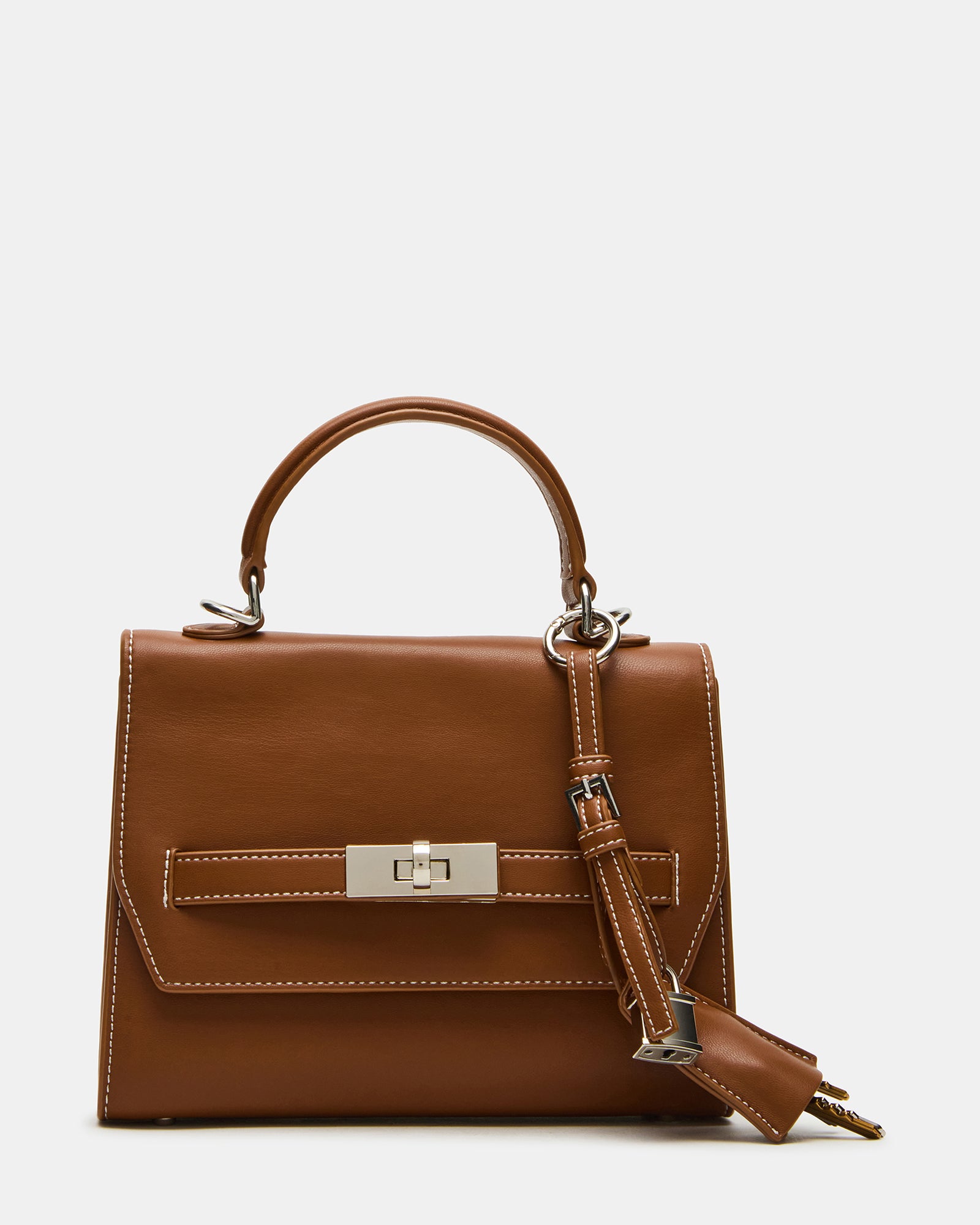 Front view of mini bag showing charm detail and magnetic closure