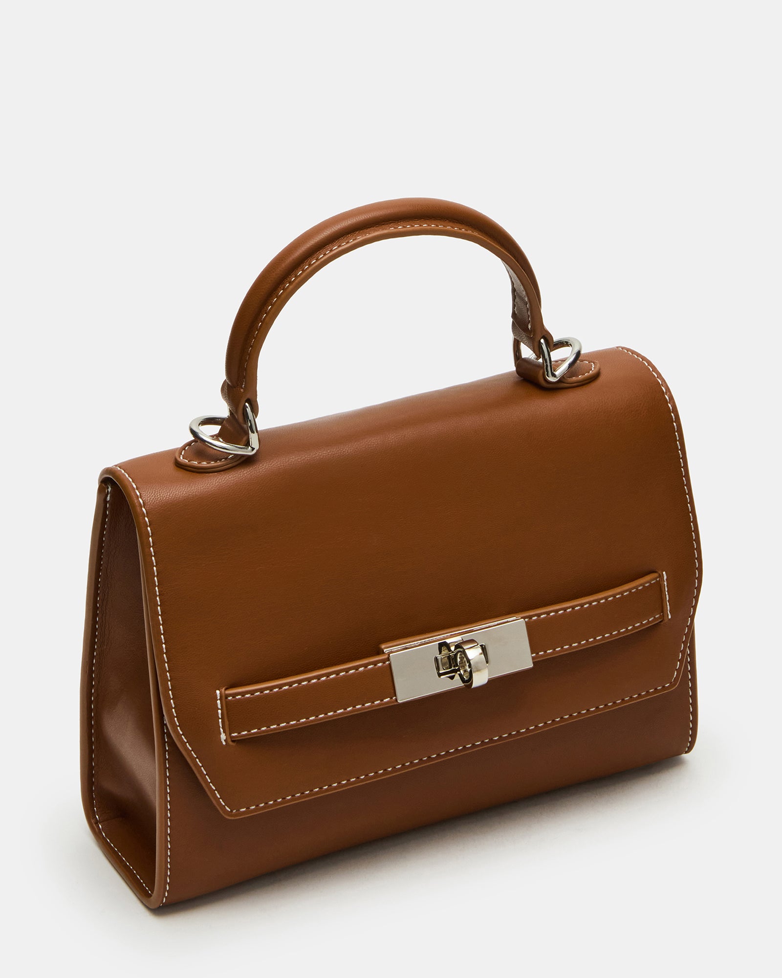 Front view of mini bag showing charm detail and magnetic closure