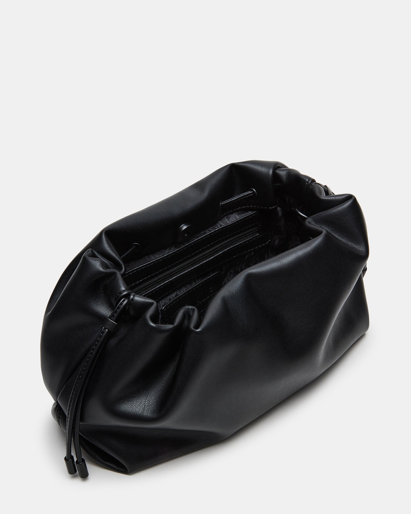 Close-up of the adjustable knot straps on the EMMY bag, demonstrating versatility