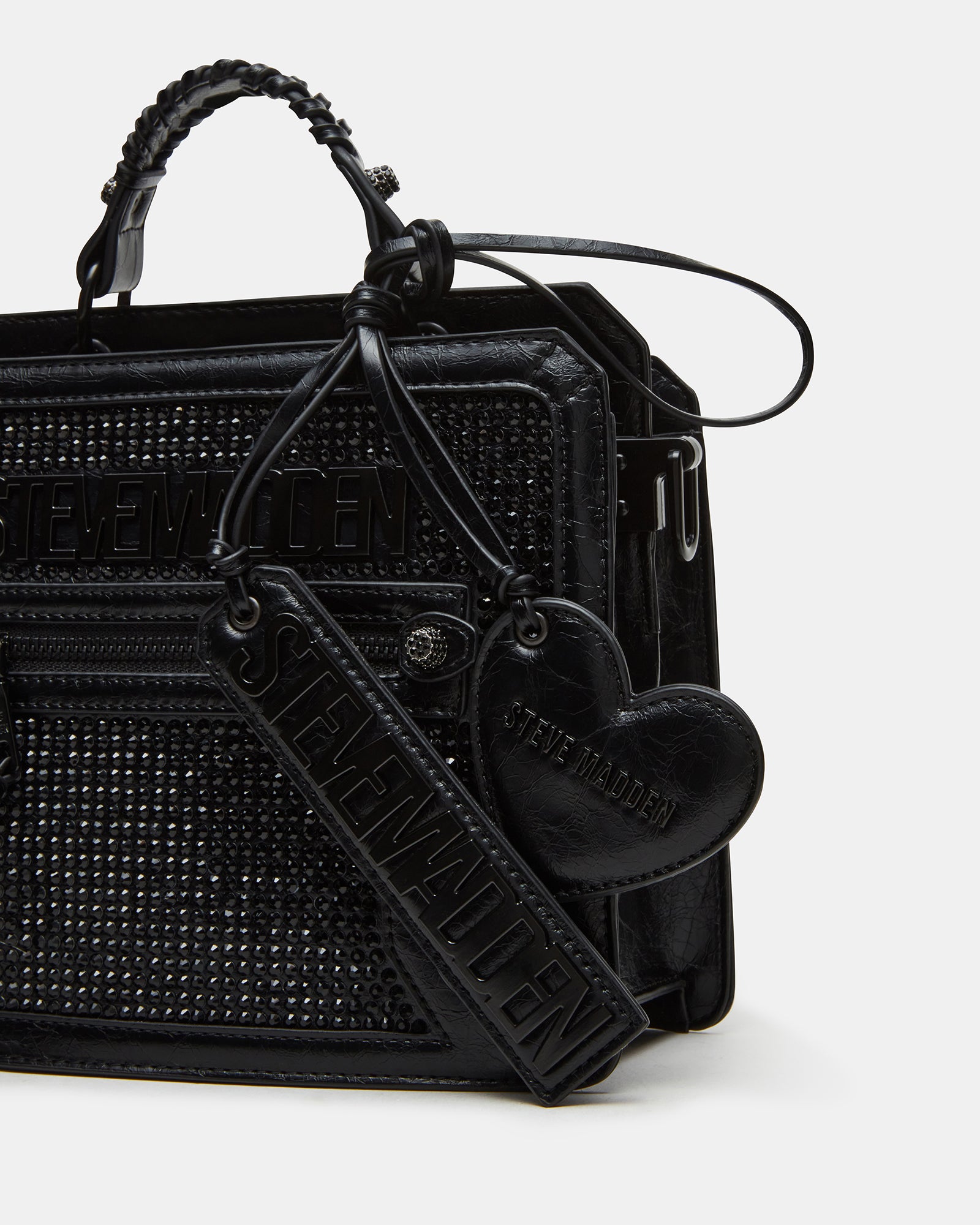 Close-up of the rhinestone details on the Evelyn Charms handbag.