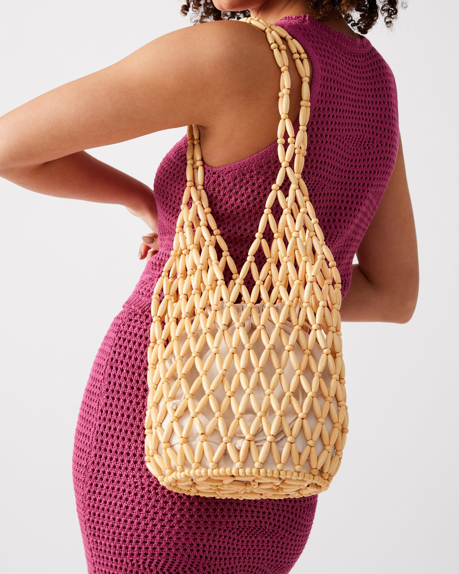 Interior shot of the bag showing the drawstring closure and zipper pocket