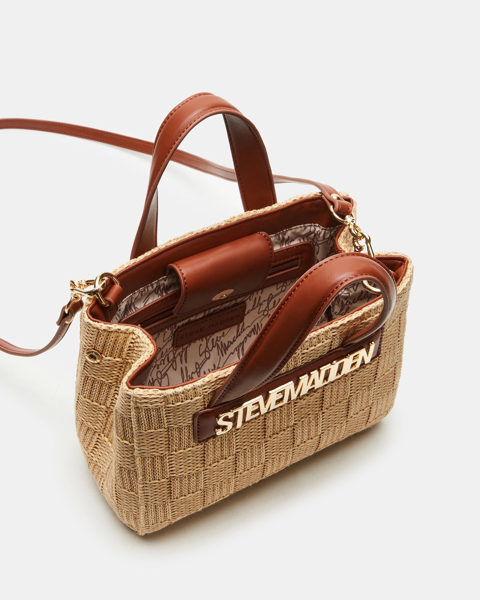Side profile highlighting the detachable crossbody strap and woven texture.