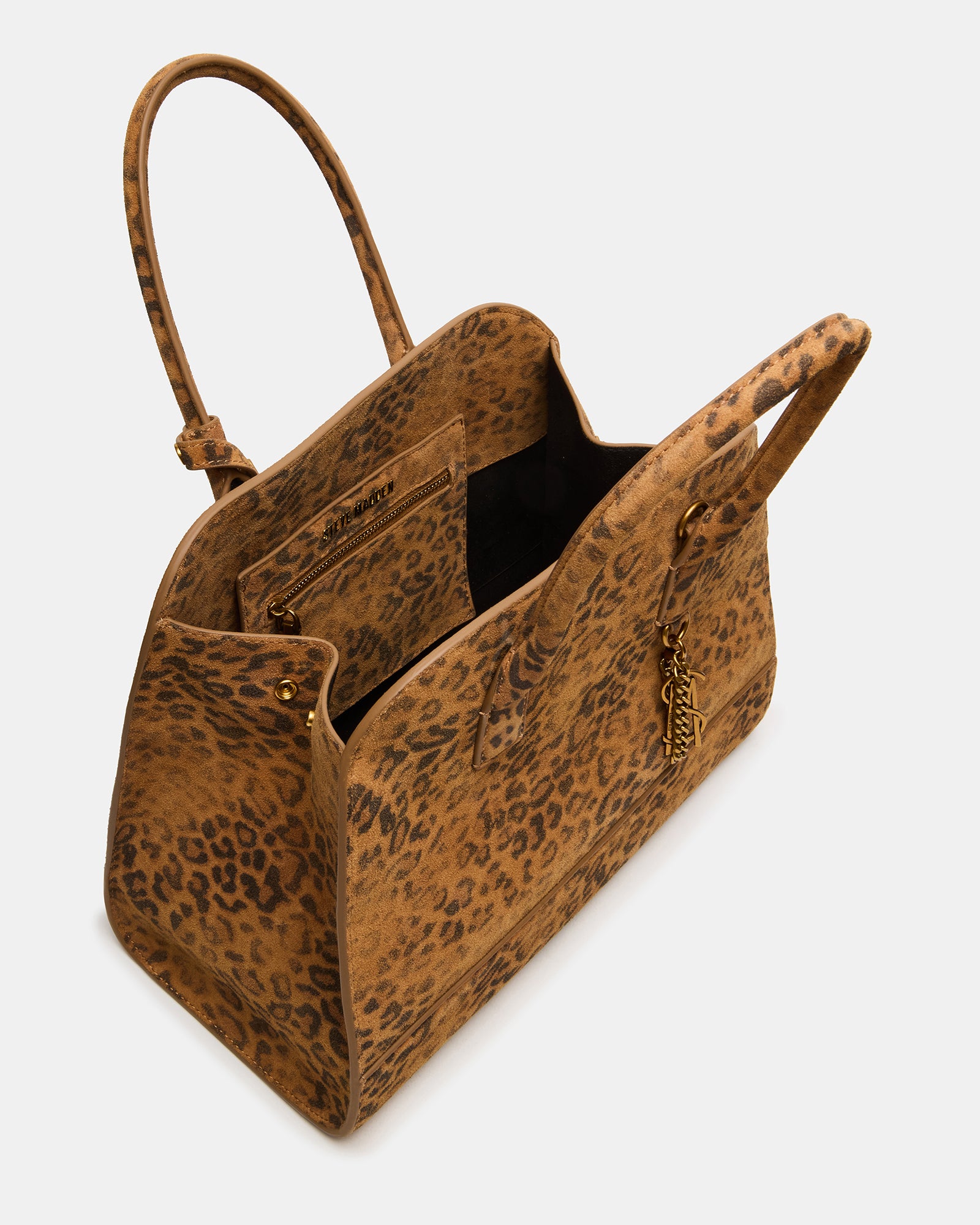 Front view of the tote bag with adjustable crossbody strap attached