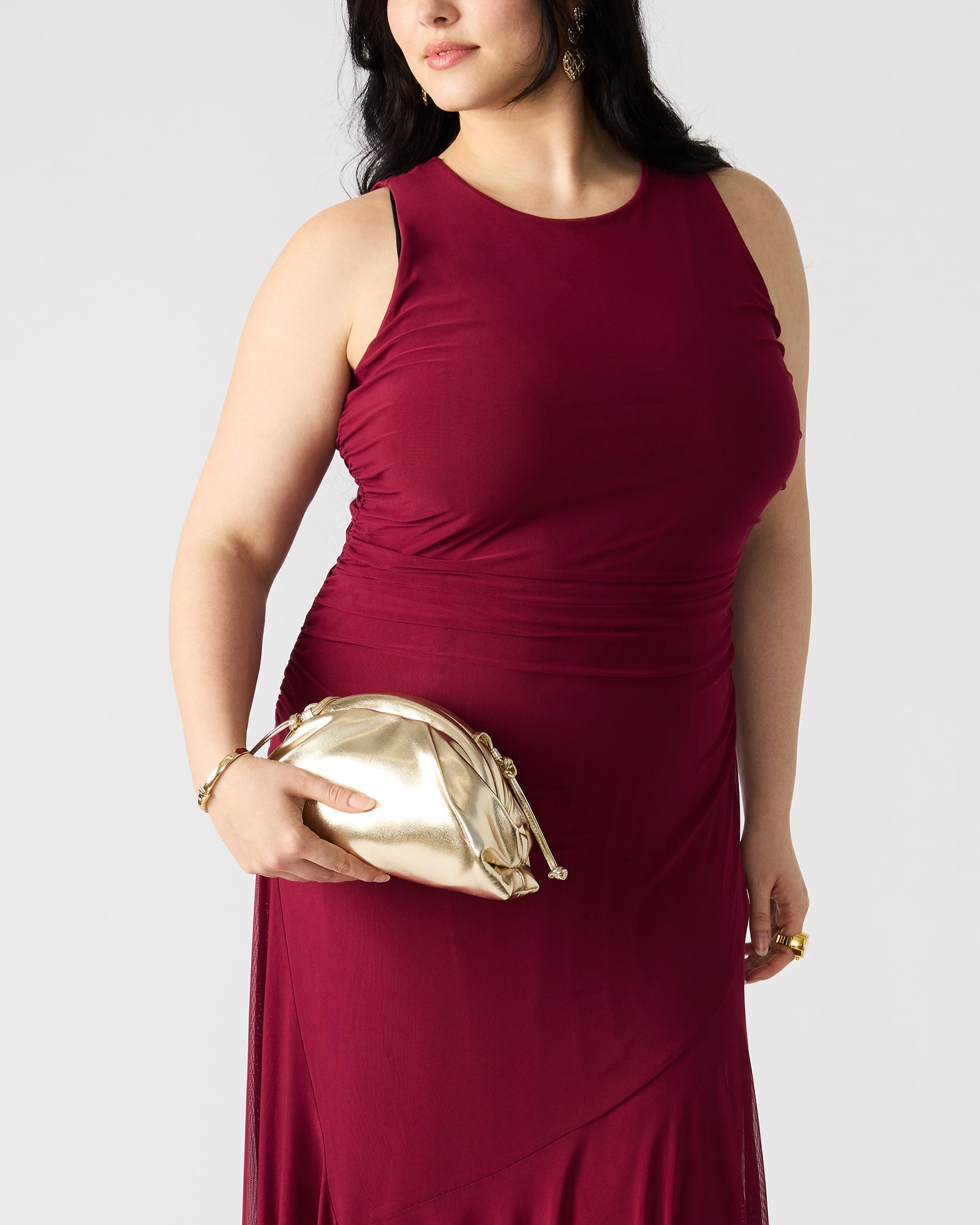Hailee crossbody bag worn over shoulder in urban setting