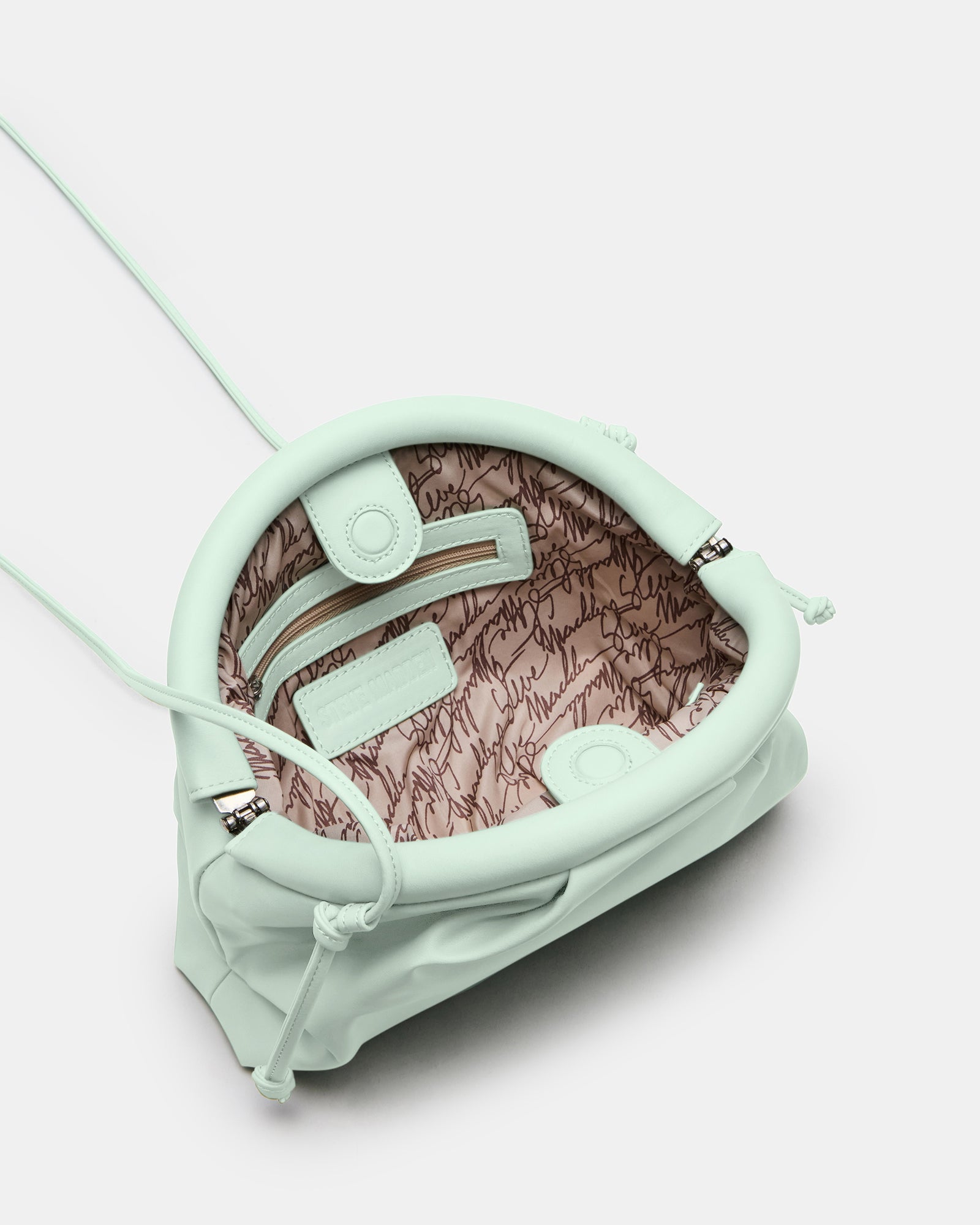 Interior of the pistachio handbag showing slip pocket