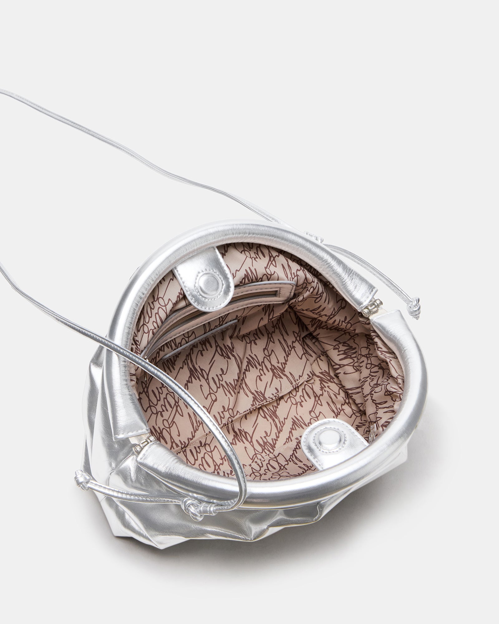 Side view of clutch bag with detachable crossbody strap