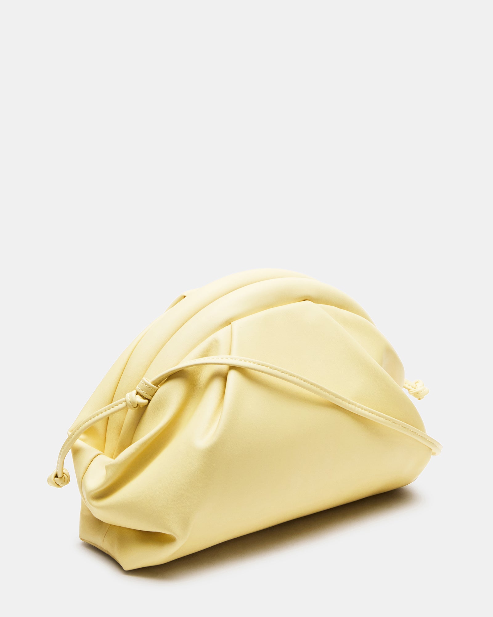 Hailee Vintage Clutch Crossbody Bag in soft leather, held in hand.