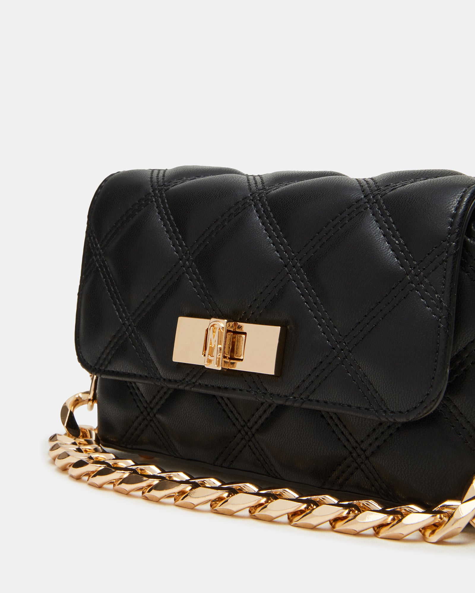 Close-up of the turn-lock closure on the Havens Quilted Bag.