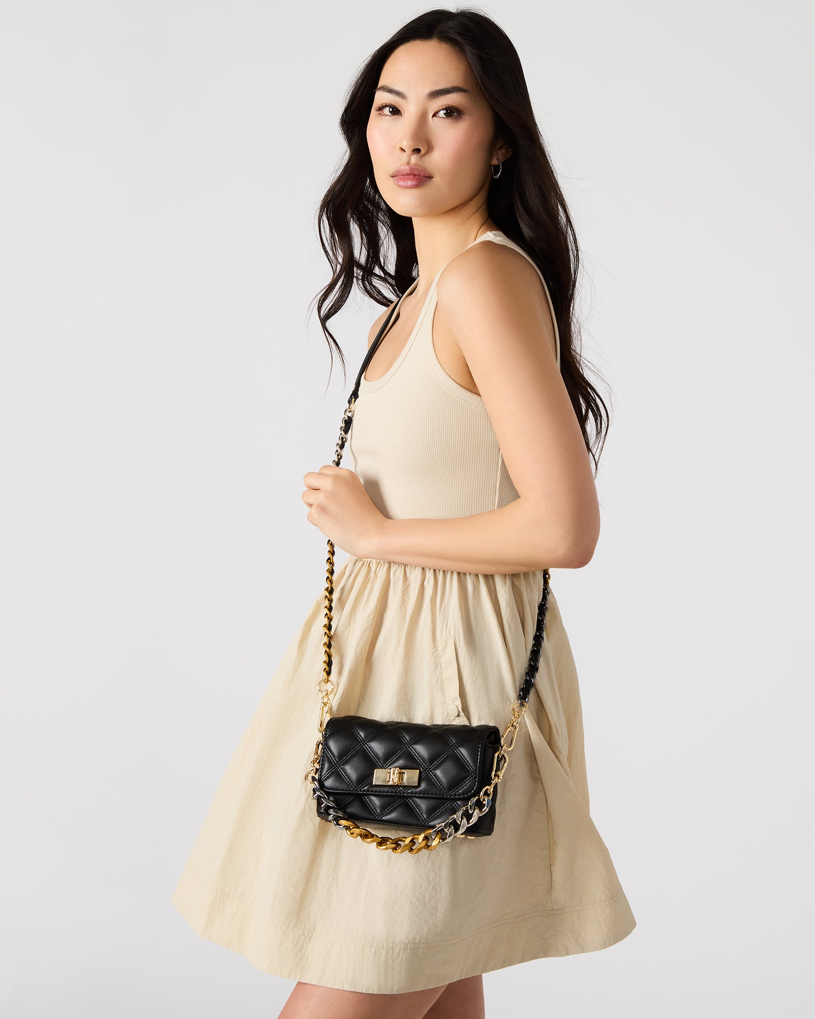 Side angle of the Havens bag highlighting the adjustable chain strap.