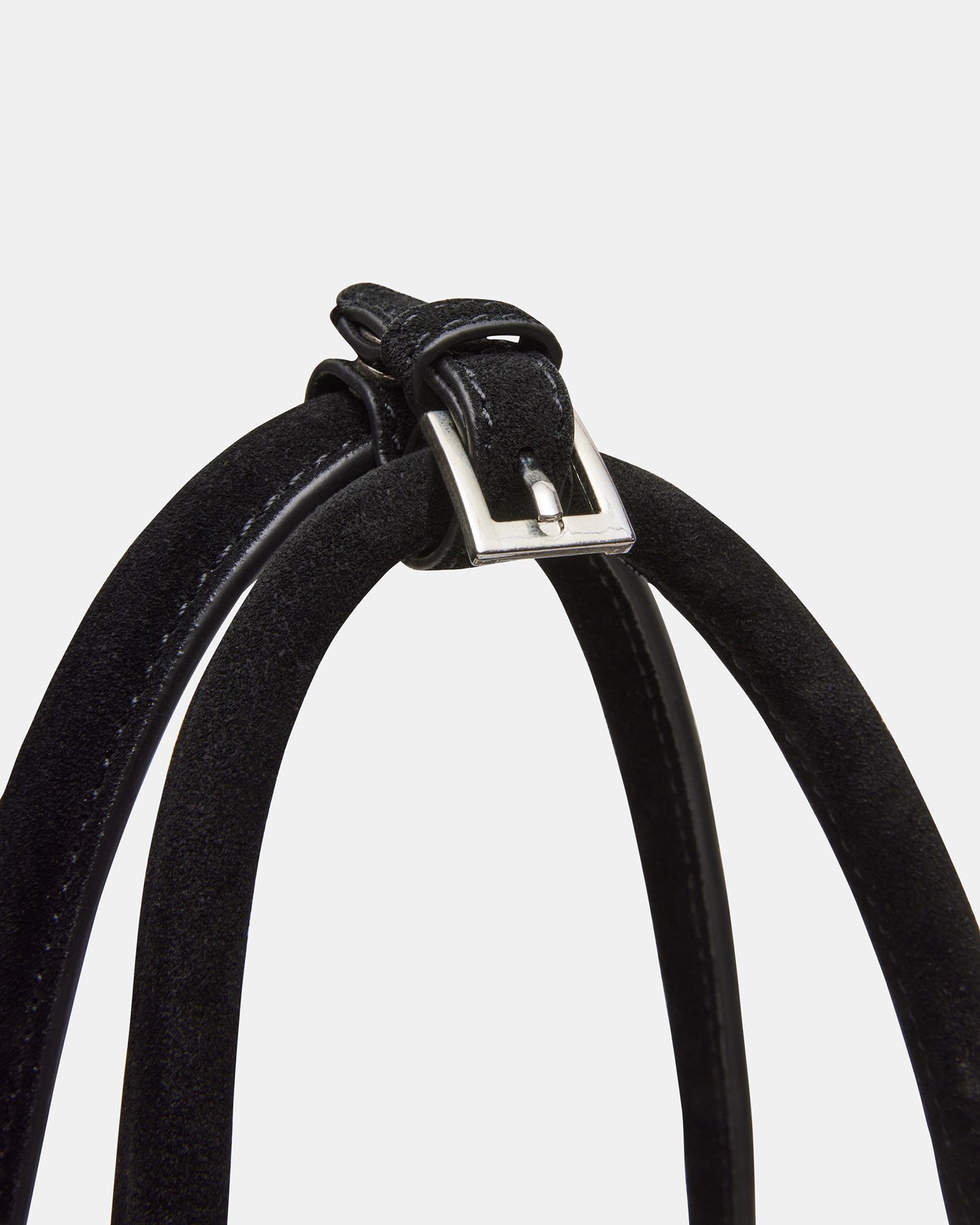 Styled shot of the suede handbag with casual outfit