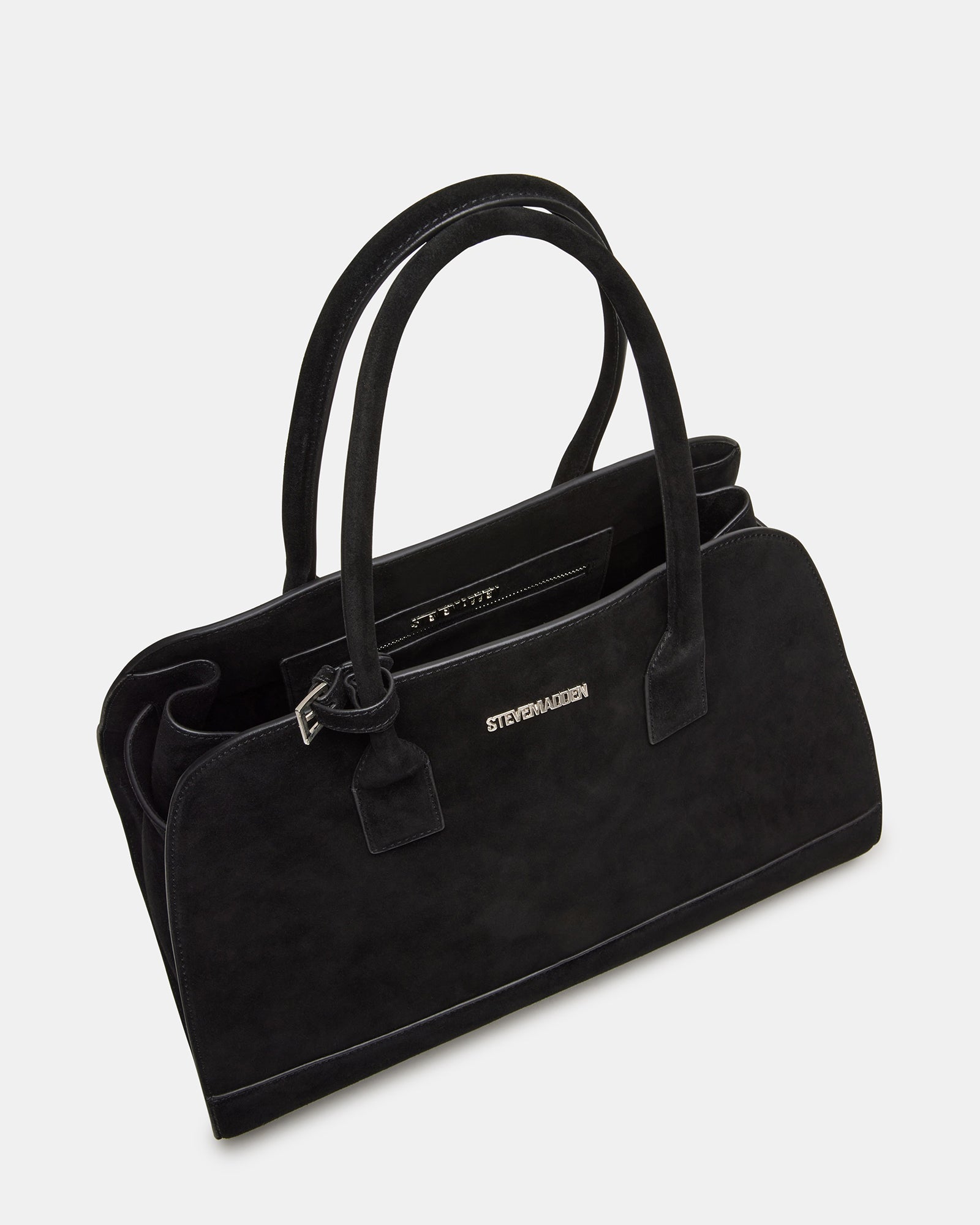 Styled shot of the suede handbag with casual outfit