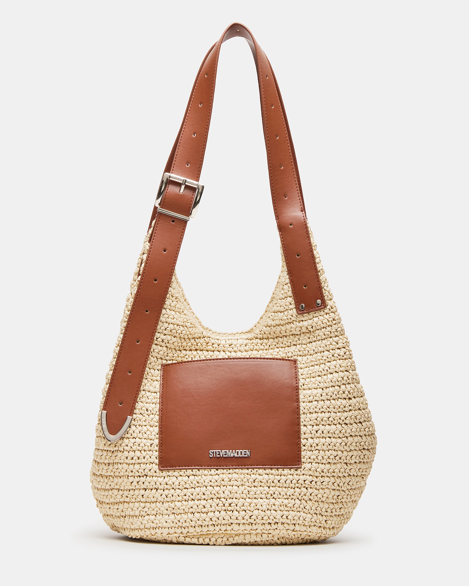 Fashionable straw hobo bag with buckle strap on a casual outfit