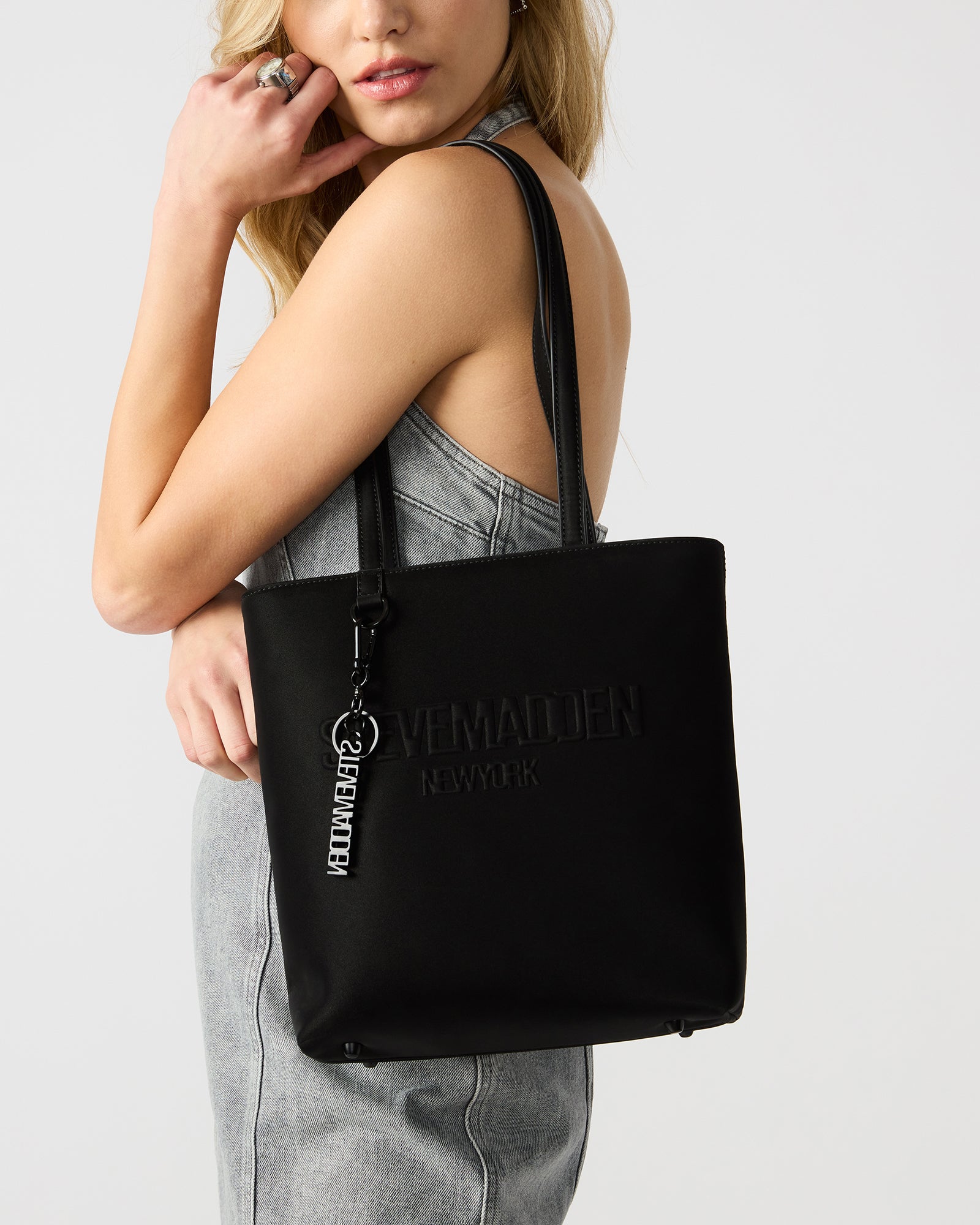 Interior shot showing the back wall pouch of the ILLIE tote bag