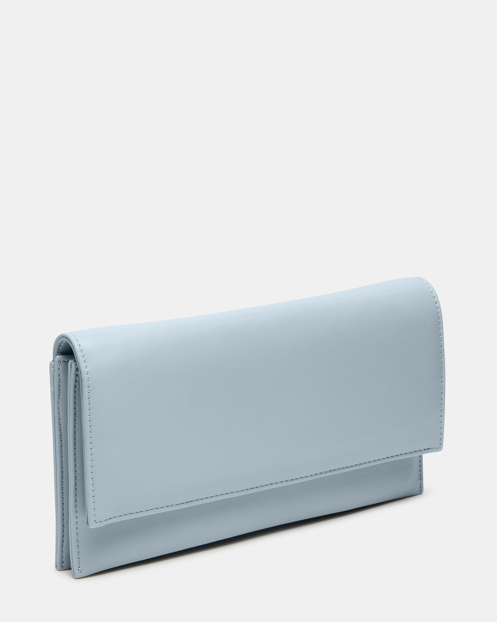 Top-angle view of the clutch bag with chain strap draped