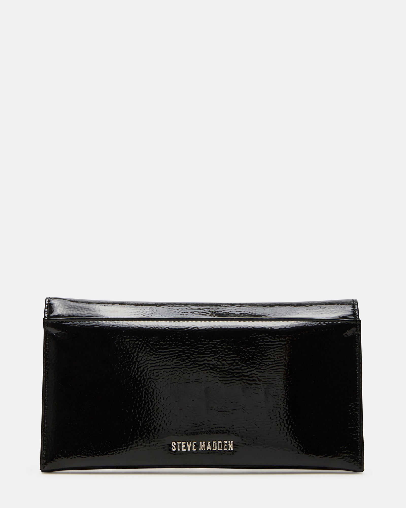 Fashionable black patent clutch handbag worn crossbody during a night out