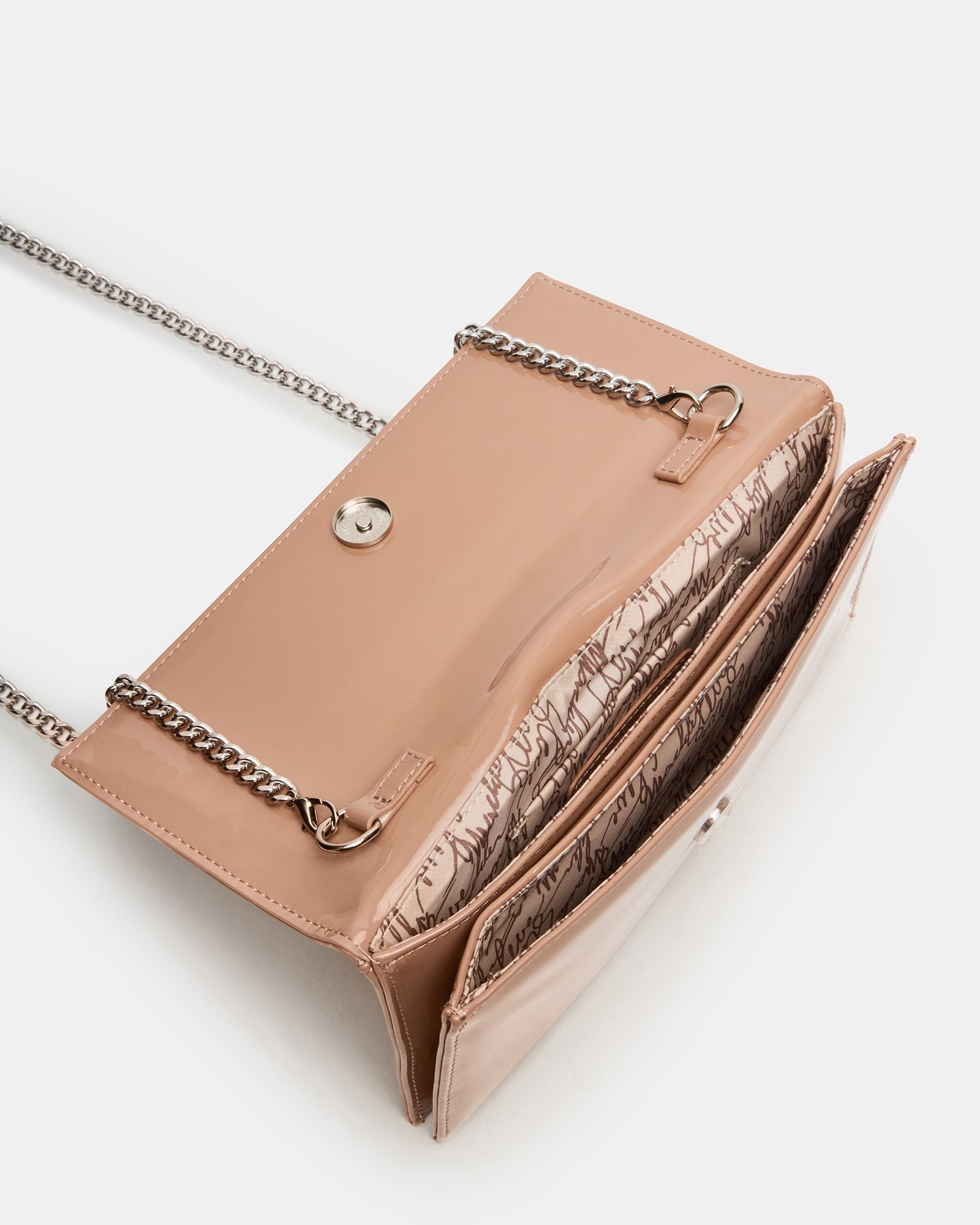 Juliana clutch bag worn crossbody with gold chain strap