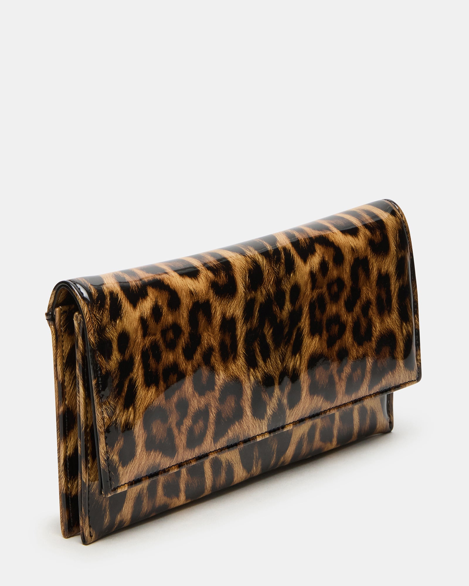 Juliana leopard print clutch purse displayed on a table, showing the chain strap detail.