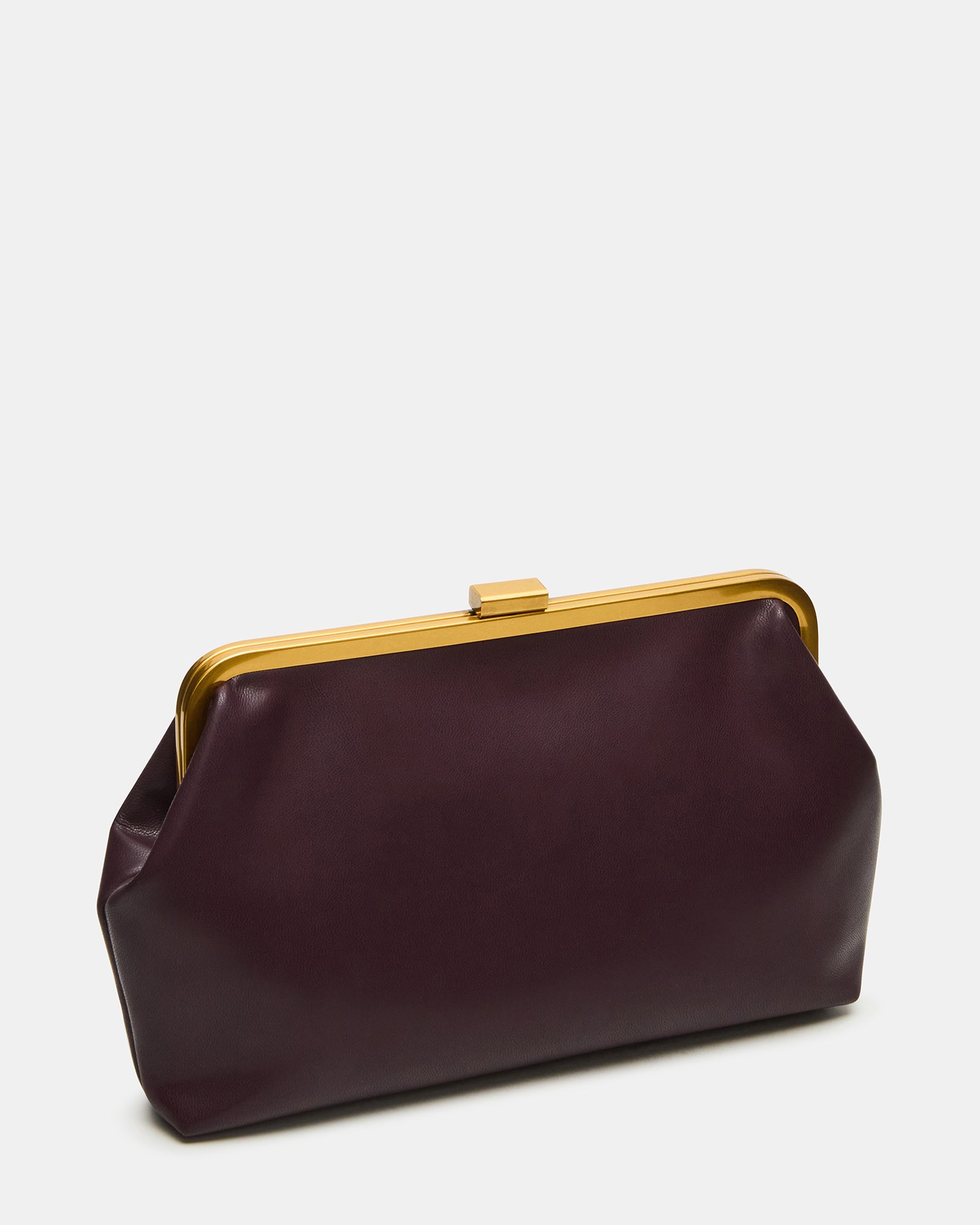 Angled front shot of the small handbag on a marble counter, chain strap displayed
