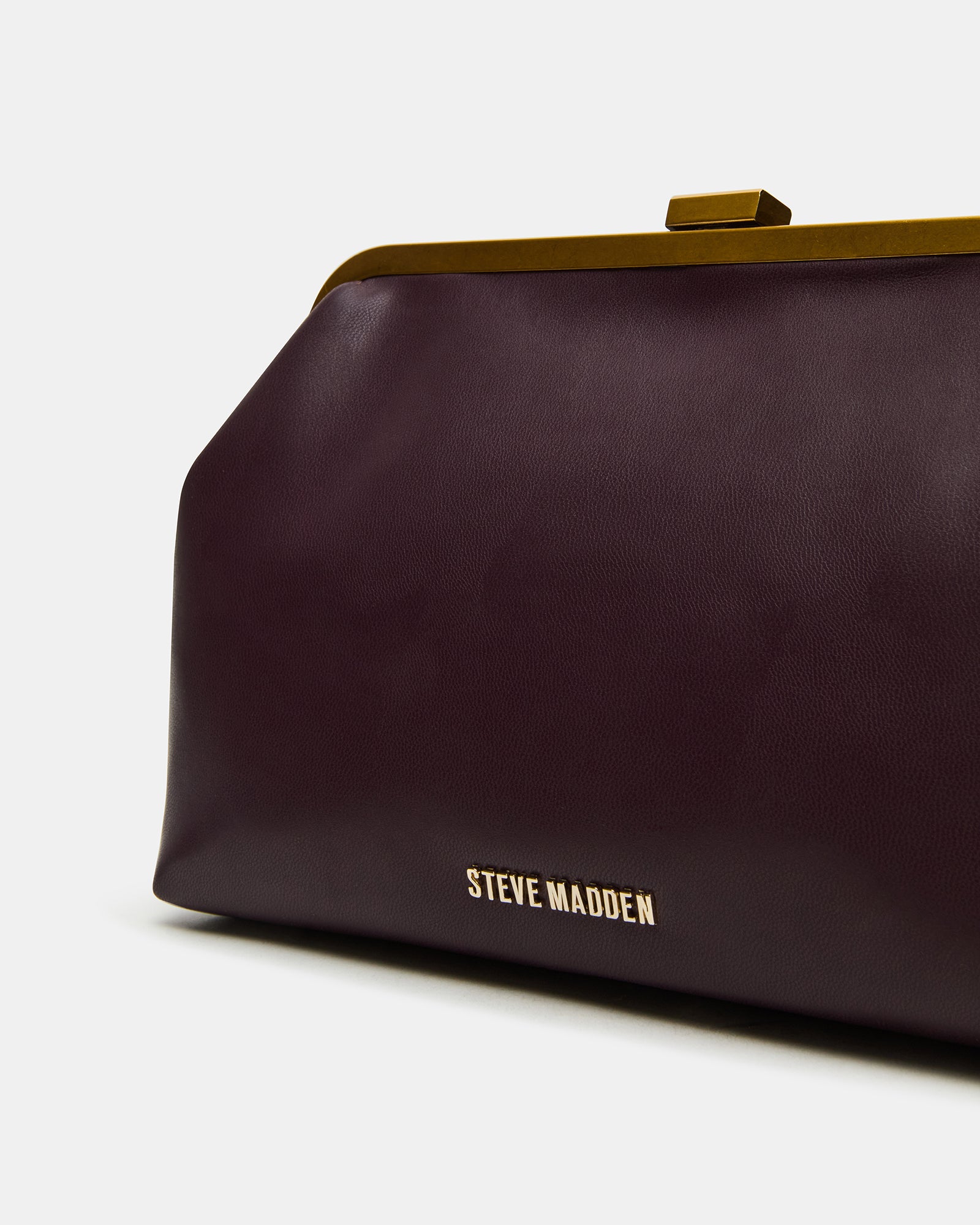 Side profile of the crossbody bag bags worn by model during a city evening out