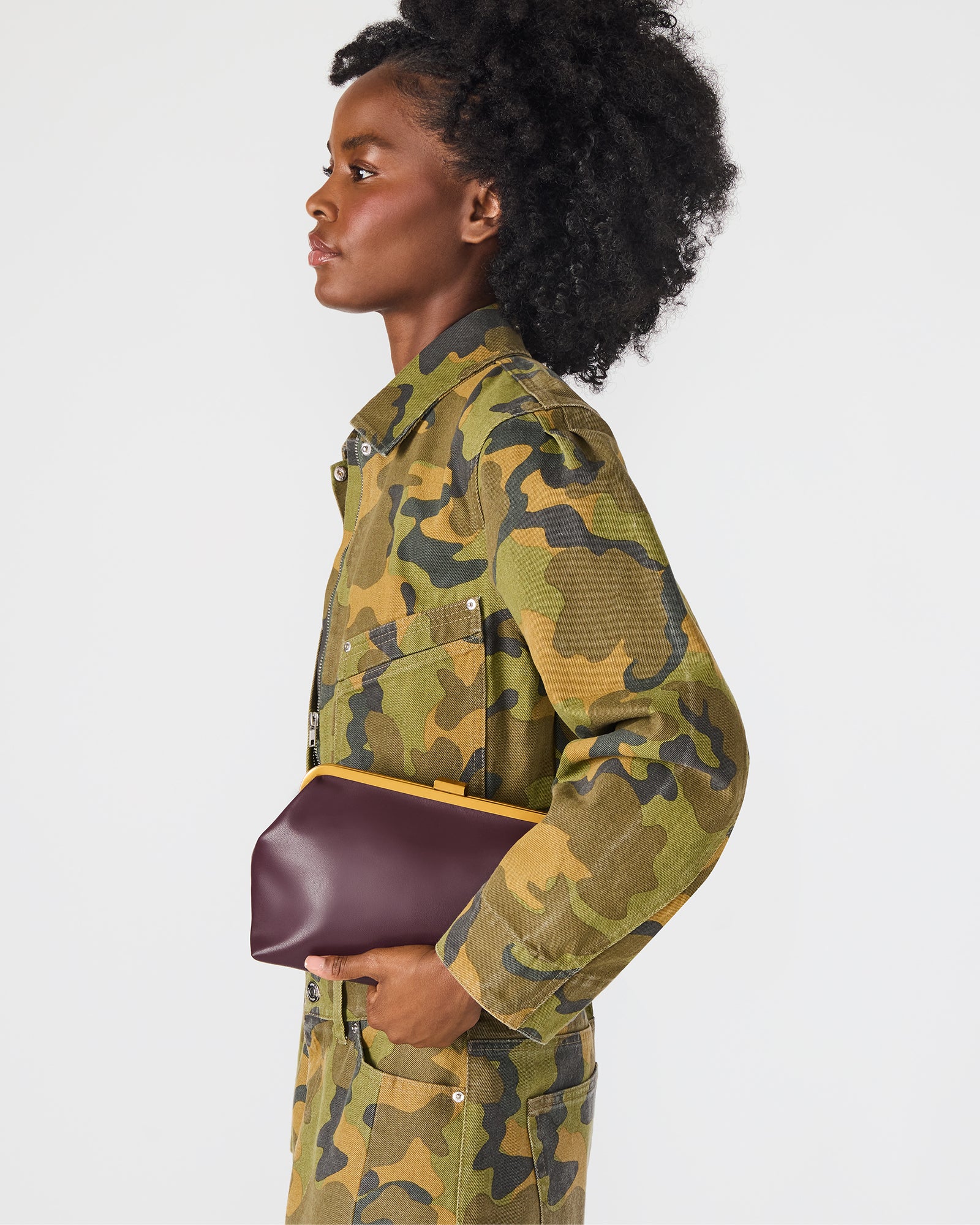 Overhead view of the black crossbody bag showing interior compartments and zipper pocket