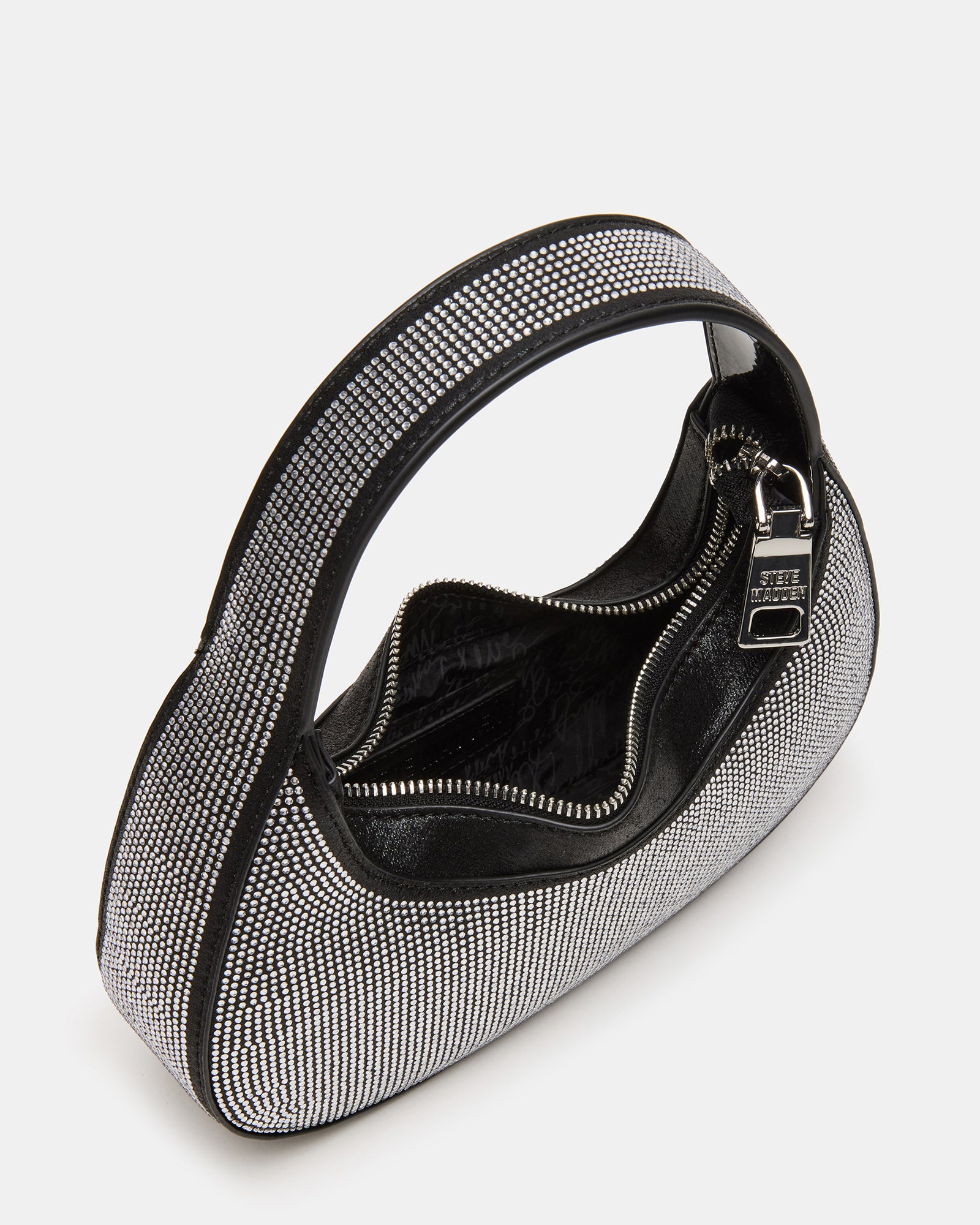 Koa handbag styled for a night out, emphasizing its chic design.