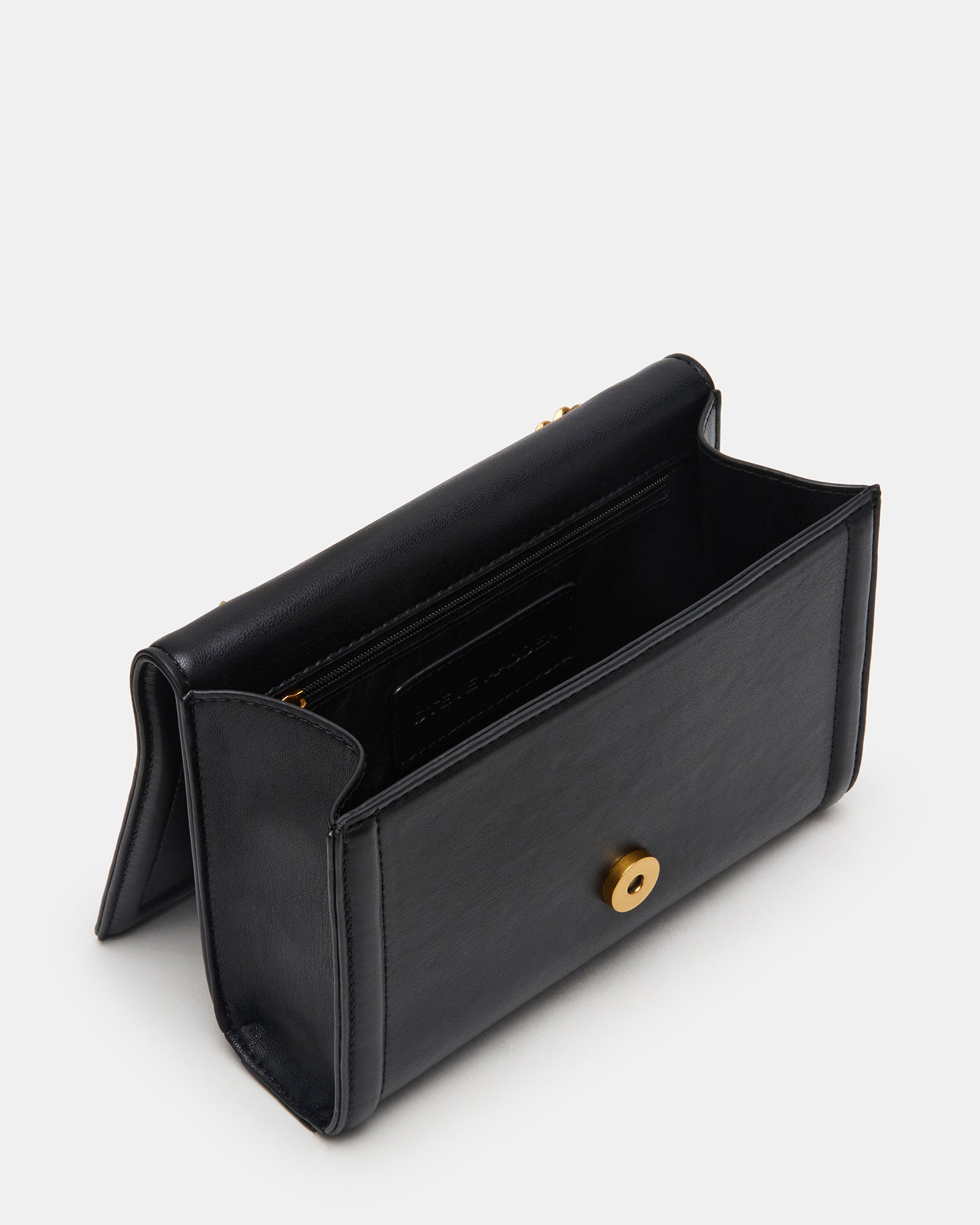 Close-up of the Larimal crossbody bags front flap and chain strap detail.