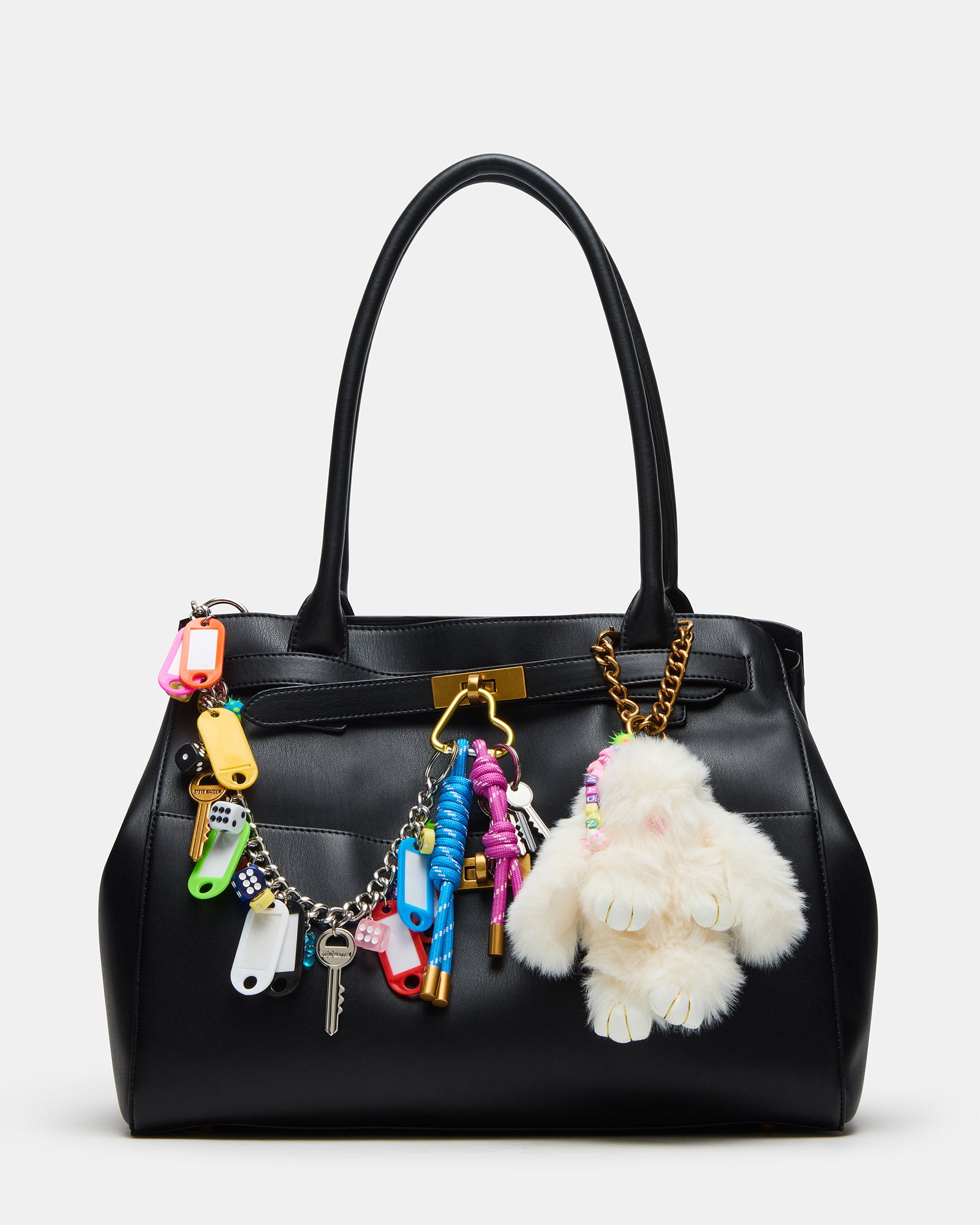 Front angle of large tote showing detachable bunny charm and tubular straps