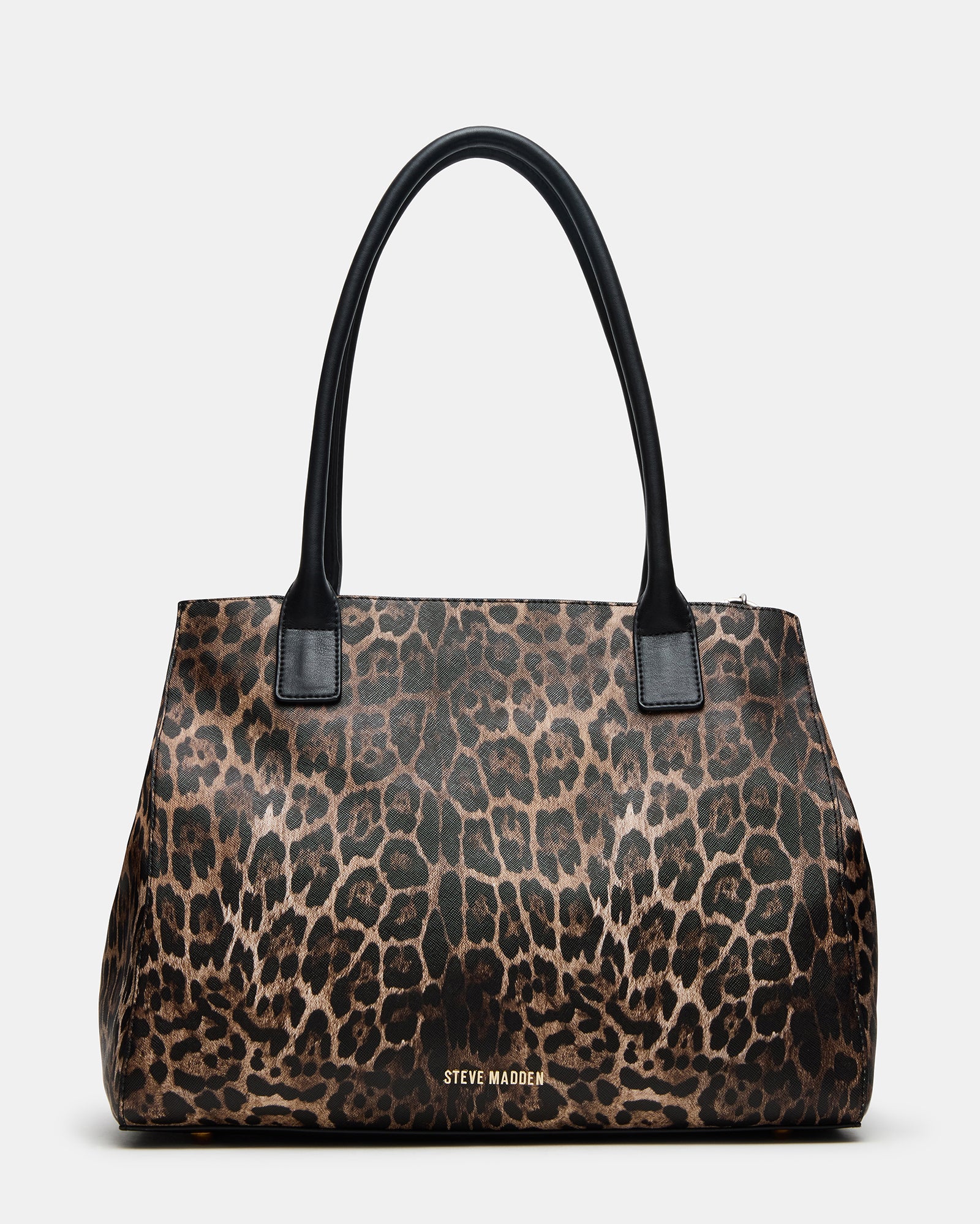 Model carrying the Leilani tote in a city setting
