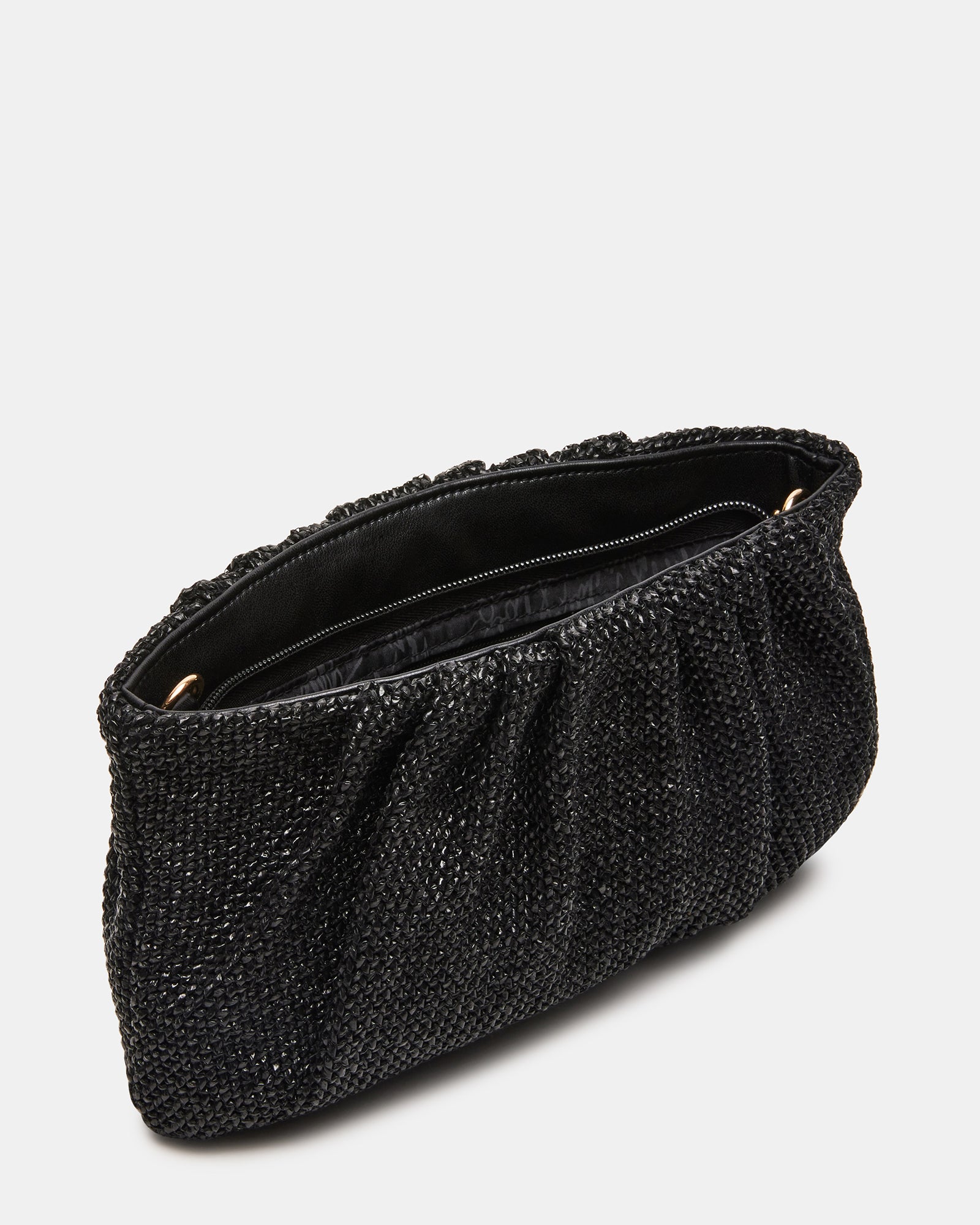 Close-up of the Lucia clutch bags zipper closure and interior pocket.