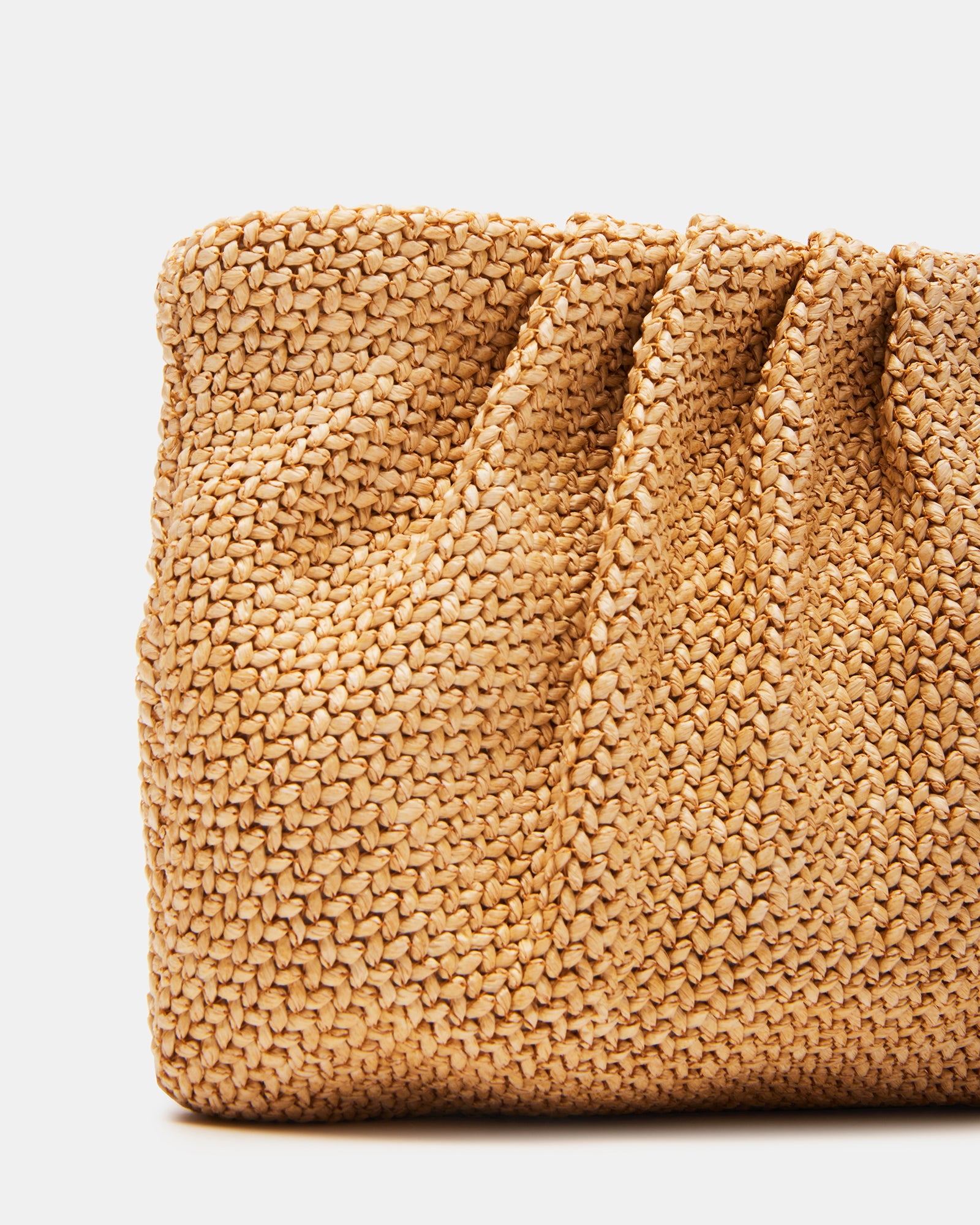 Lucia clutch bag displayed with duster bag, highlighting its chic and versatile style.