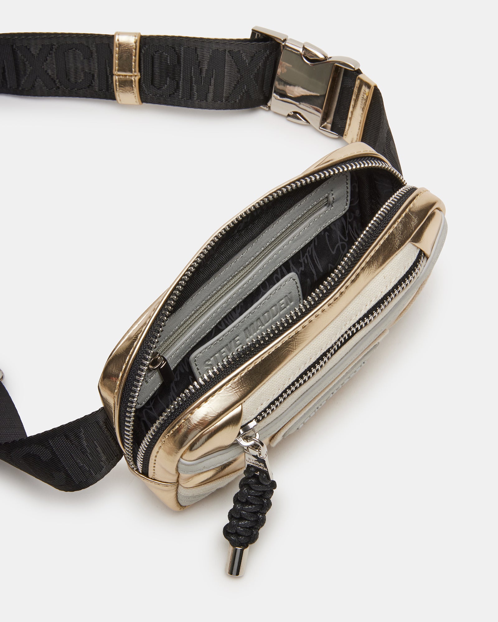 Madrid belt bag styled as crossbody on a model in urban setting