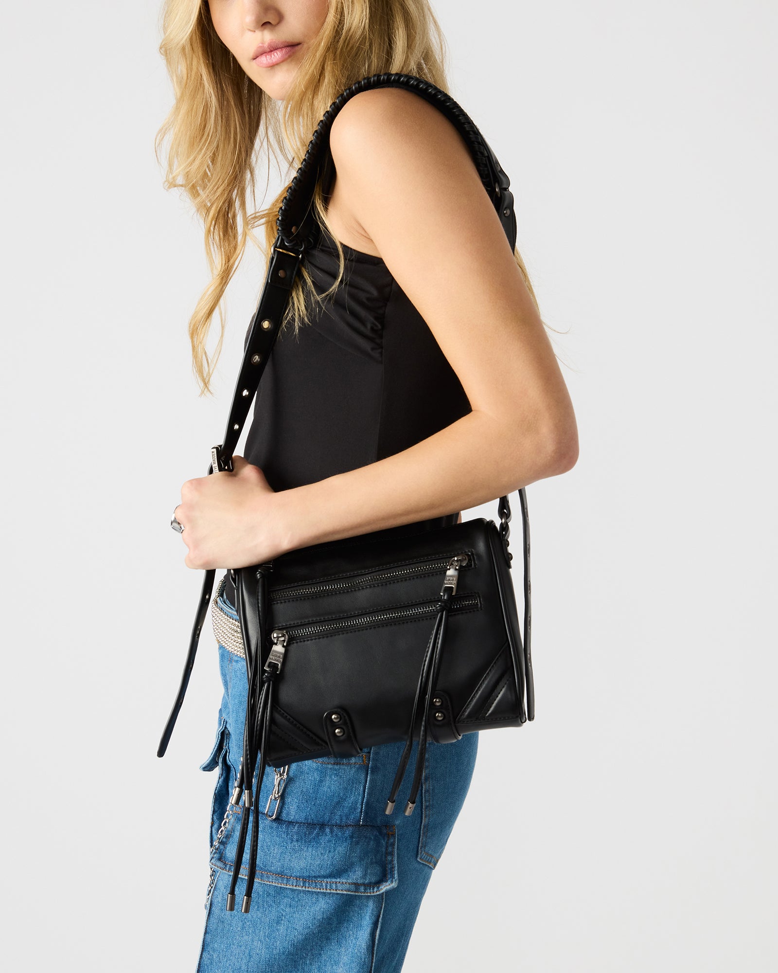 Side angle of the Rigby bag highlighting its adjustable strap.