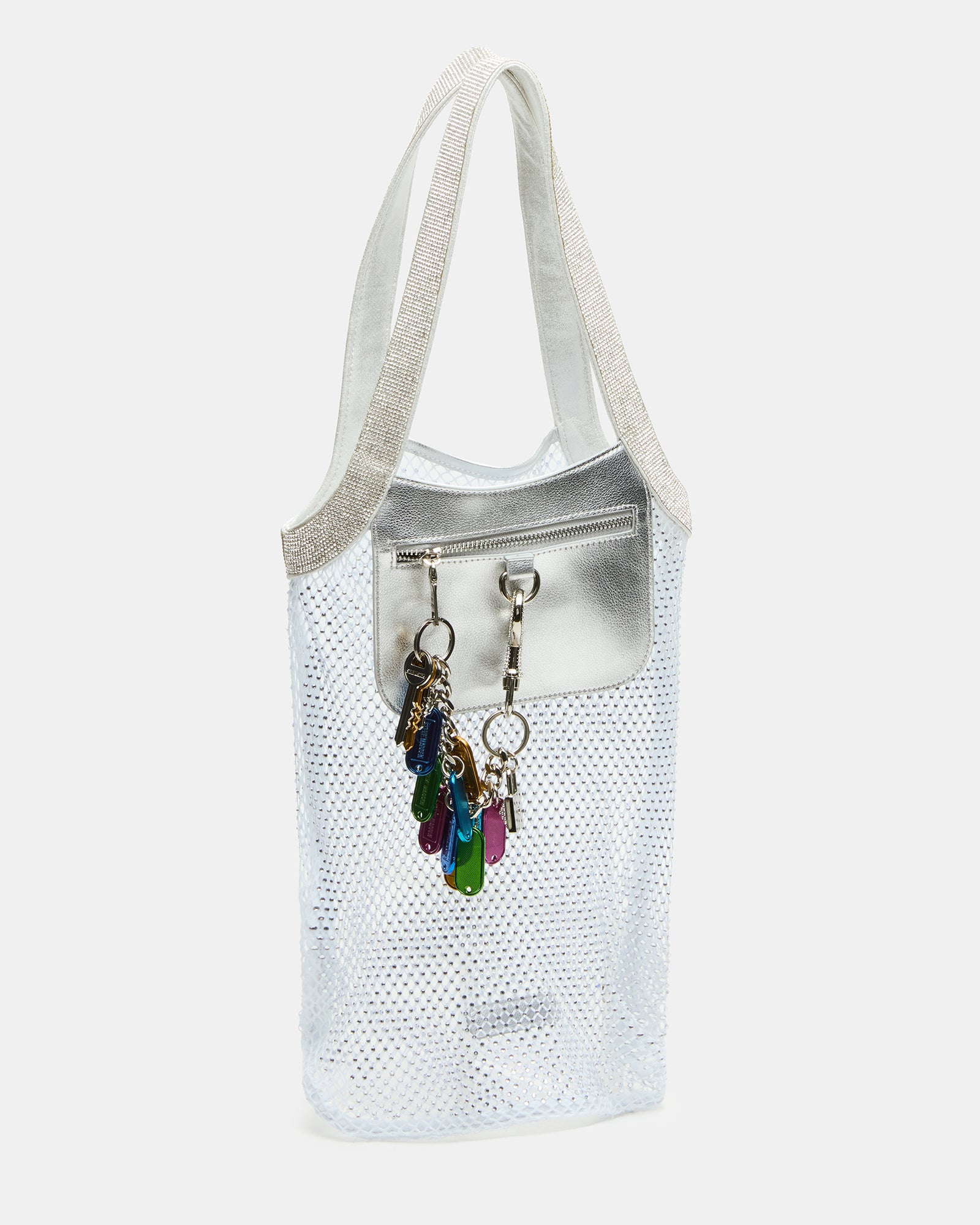Close-up of MAKIA white leather tote bag showing rhinestone strap details