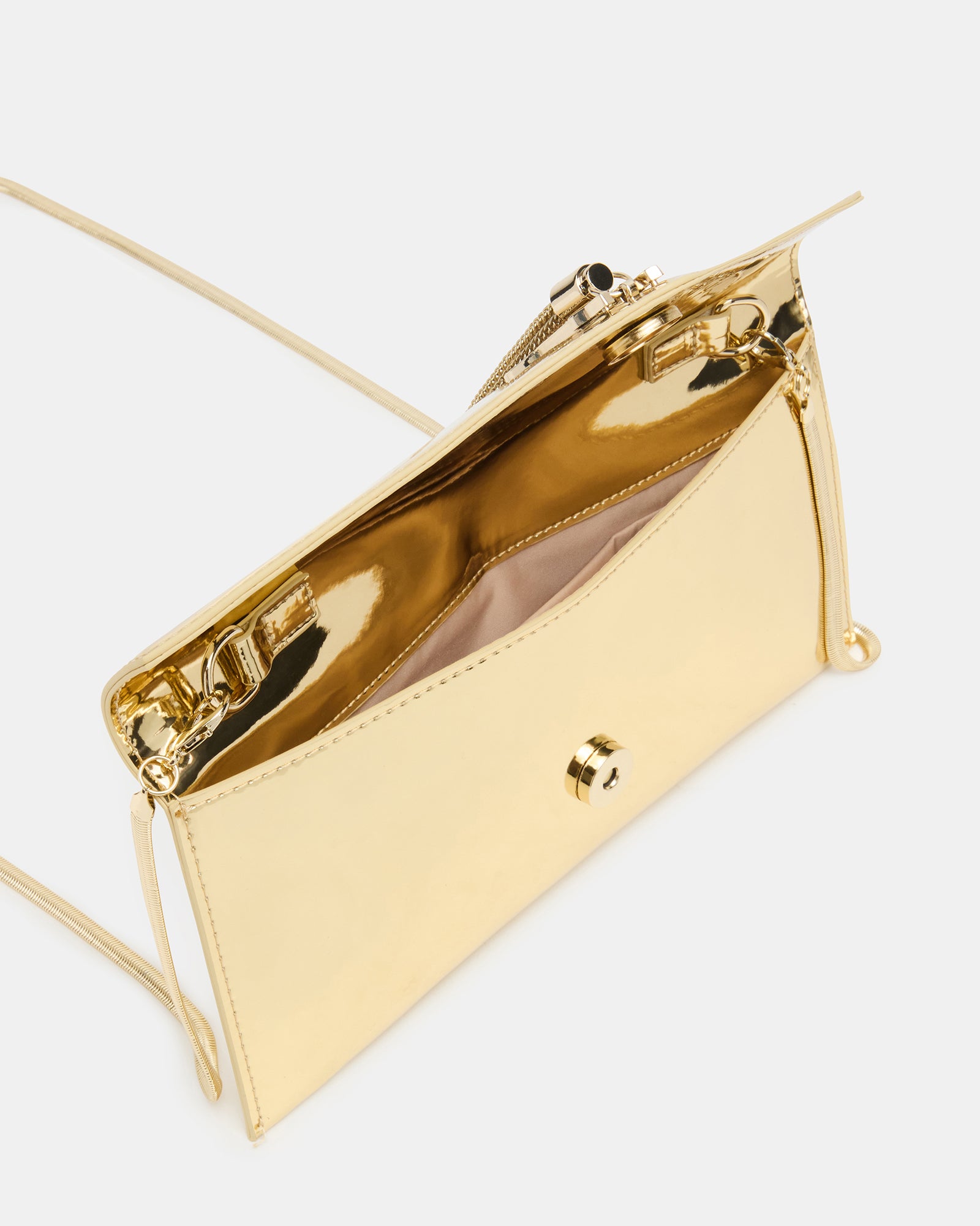 Clutch open showing spacious interior with zip pocket and makeup essentials