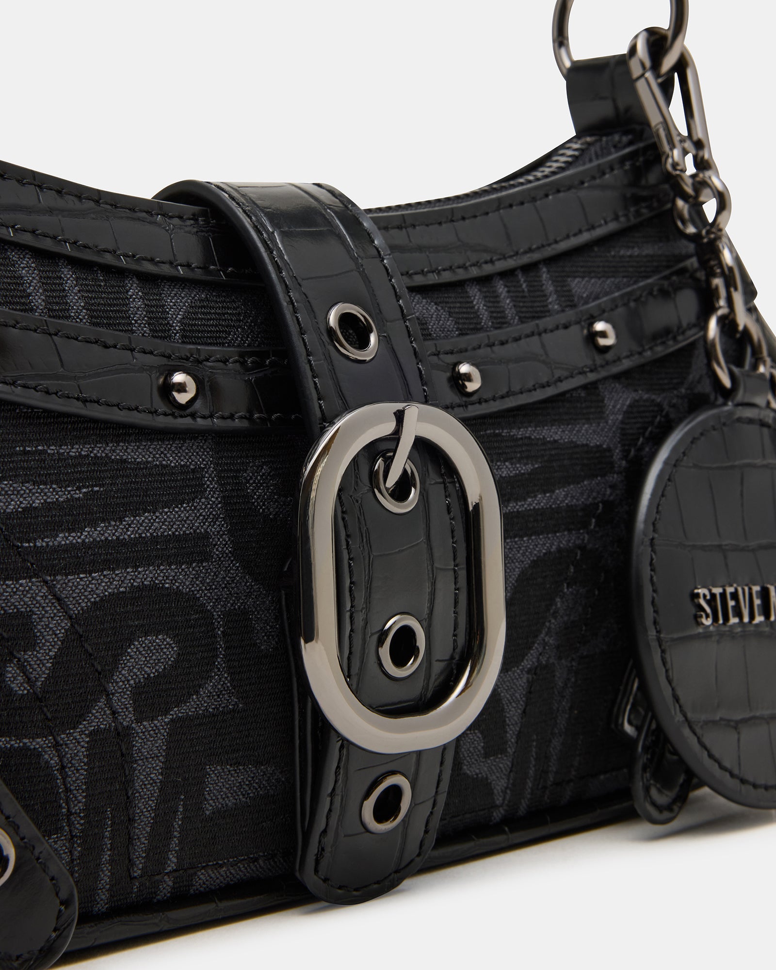 Stylish model carrying the black multi vintage bag crossbody