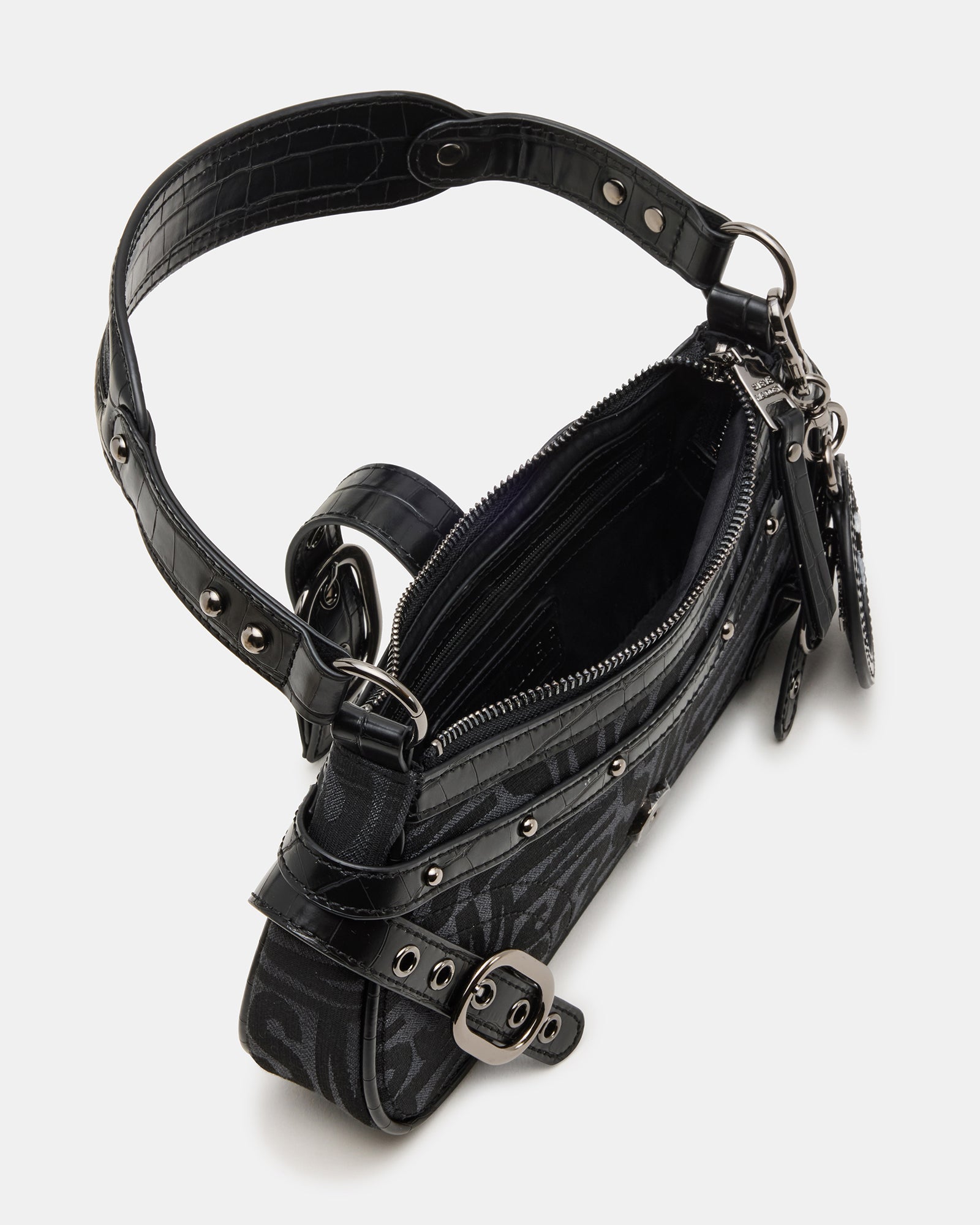Close-up of the detachable mirror charm on the shoulder bag