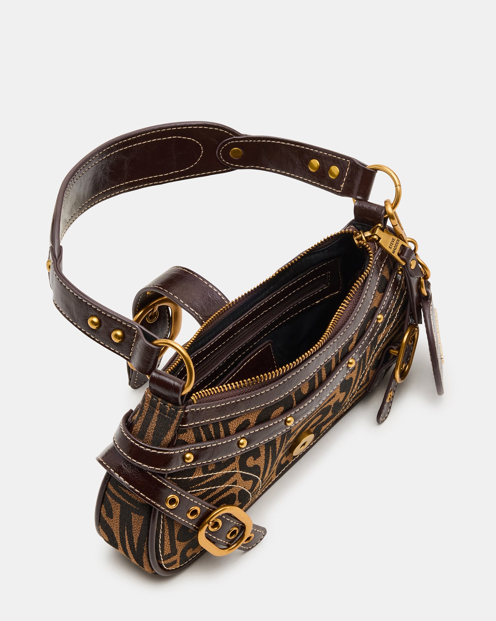 Interior of the shoulder bag displaying spacious compartments and pockets.