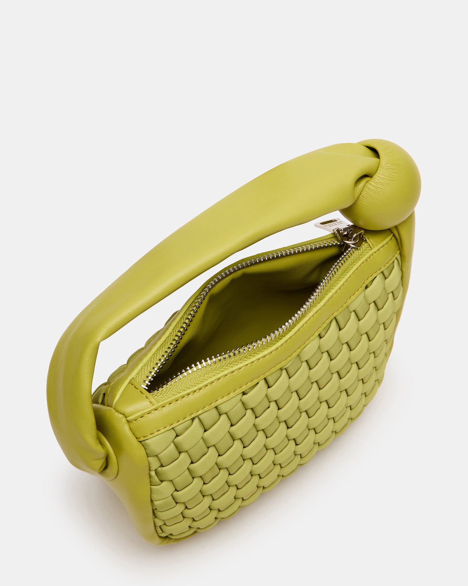 Close-up of the woven leather tote handbag showcasing the zipper closure.