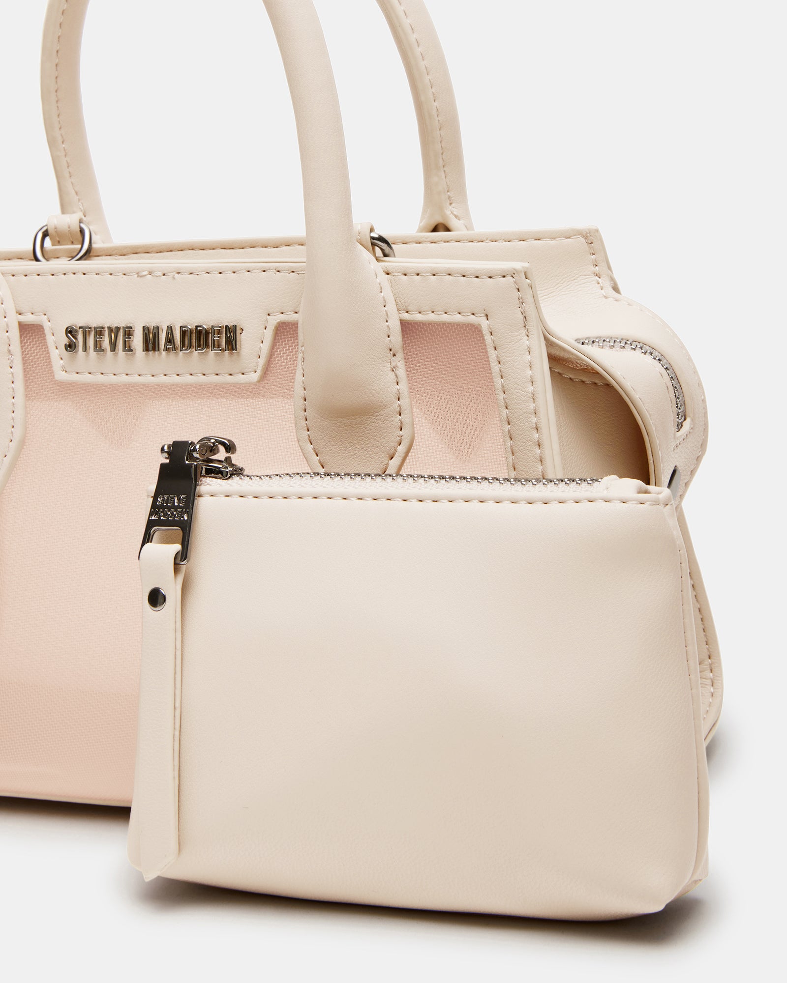 Interior shot of the removable pouch inside the Peachy Natural mini bag