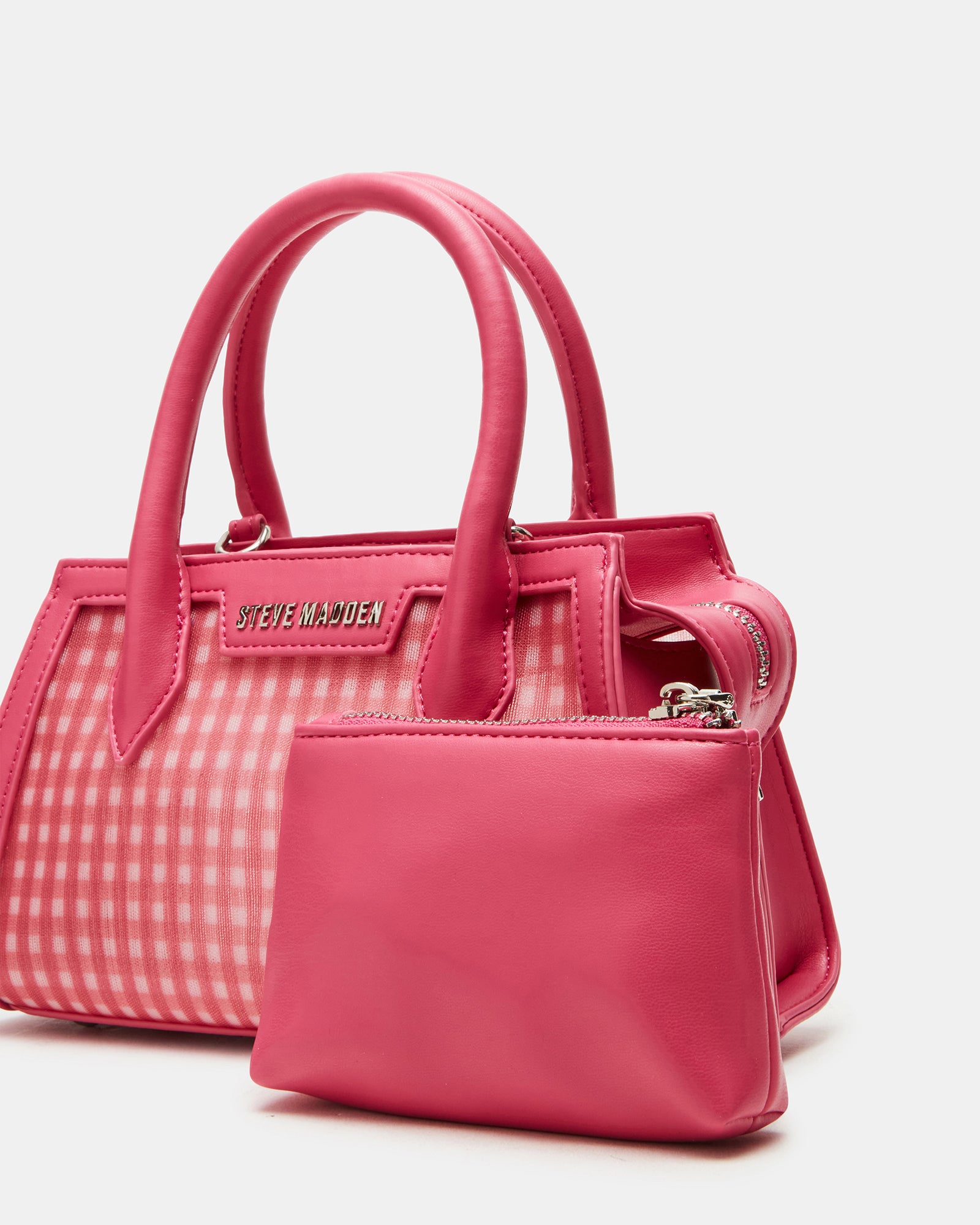 Mini handbag black strap variant shown next to included pouch
