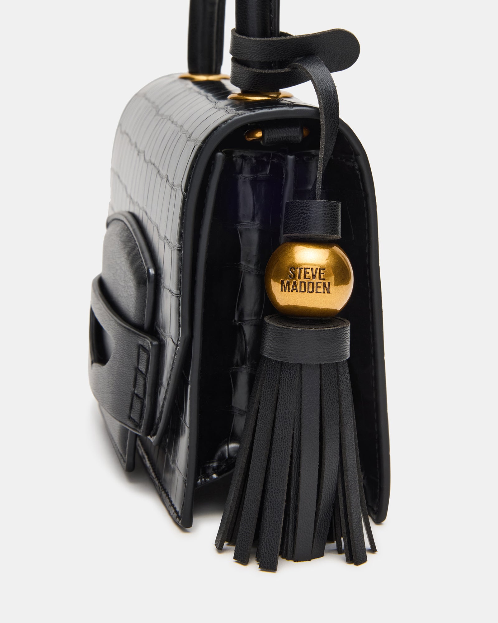 Chic black preppy bag displayed with removable crossbody strap.
