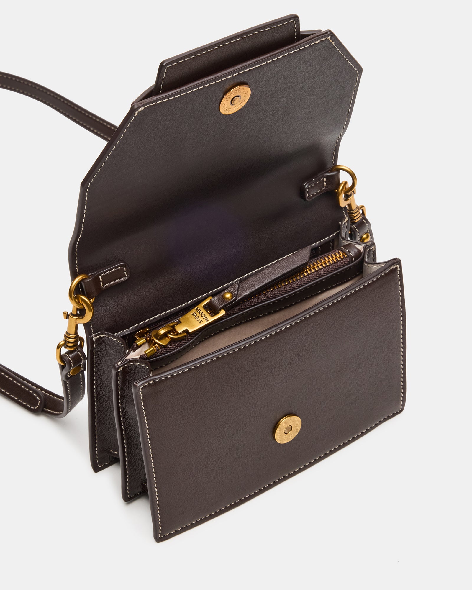 Side view highlighting the adjustable crossbody strap of the black bag.